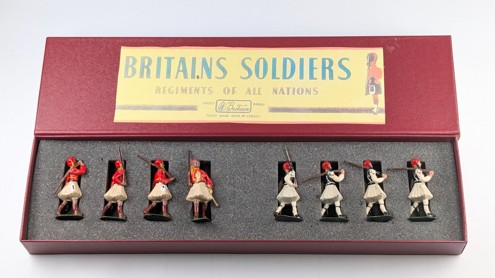 VINTAGE BRITAINS VARIOUS EVZONES SOLDIERS: ALL REMAIN IN GOOD CONDITION, SHOWING SOME TYPICAL WEAR. CUSTOM BOX.