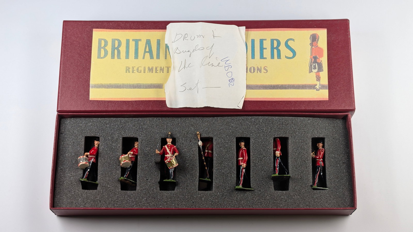 VINTAGE BRITAINS DRUM & BUGLE OF THE LINE: SET REMAINS IN GOOD CONDITION, SHOWING SOME TYPICAL WEAR. CUSTOM BOX.