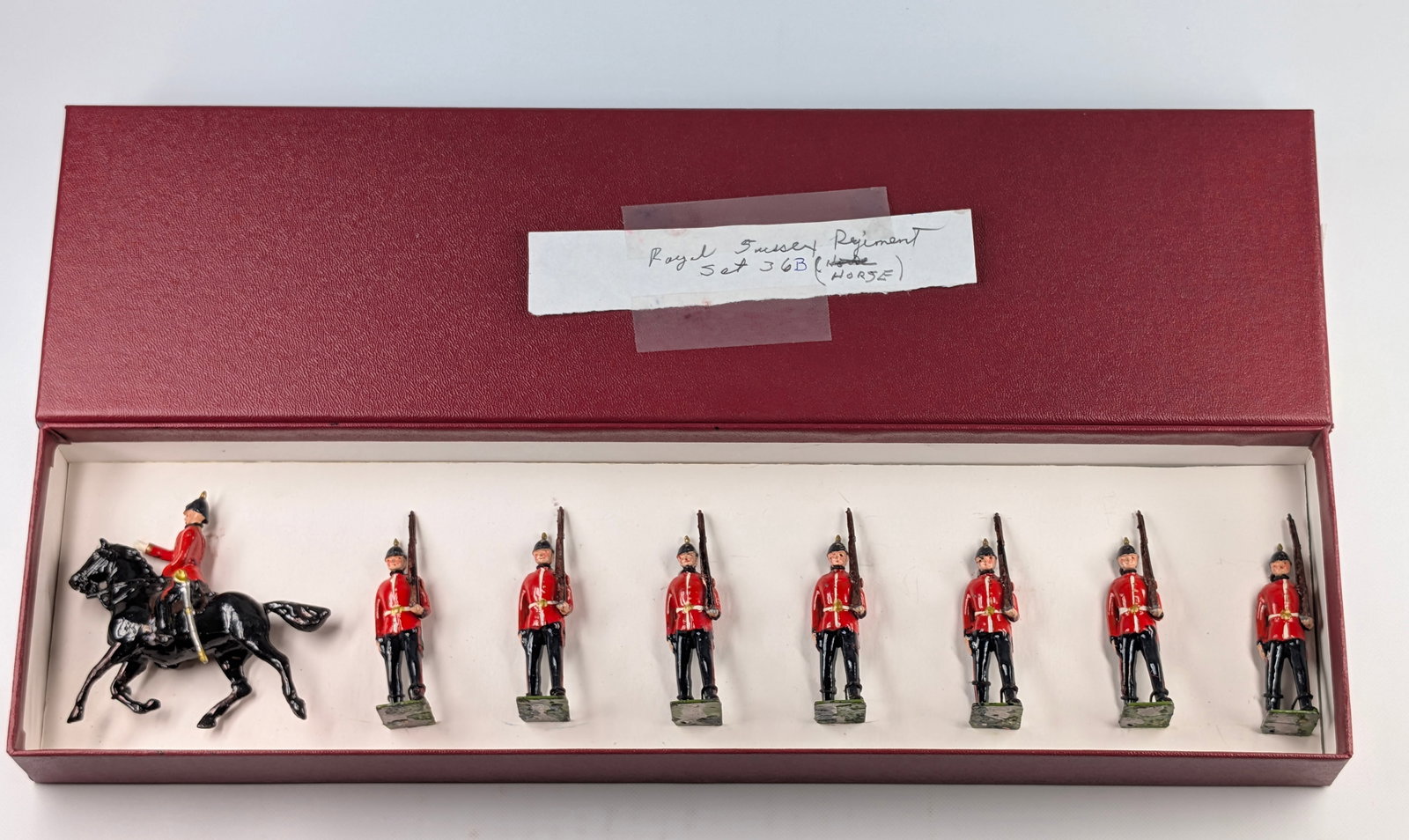 VINTAGE BRITAINS ROYAL SUSSEX REGIMENT: SET REMAINS IN GOOD CONDITION, SHOWING SOME TYPICAL WEAR. CUSTOM BOX.