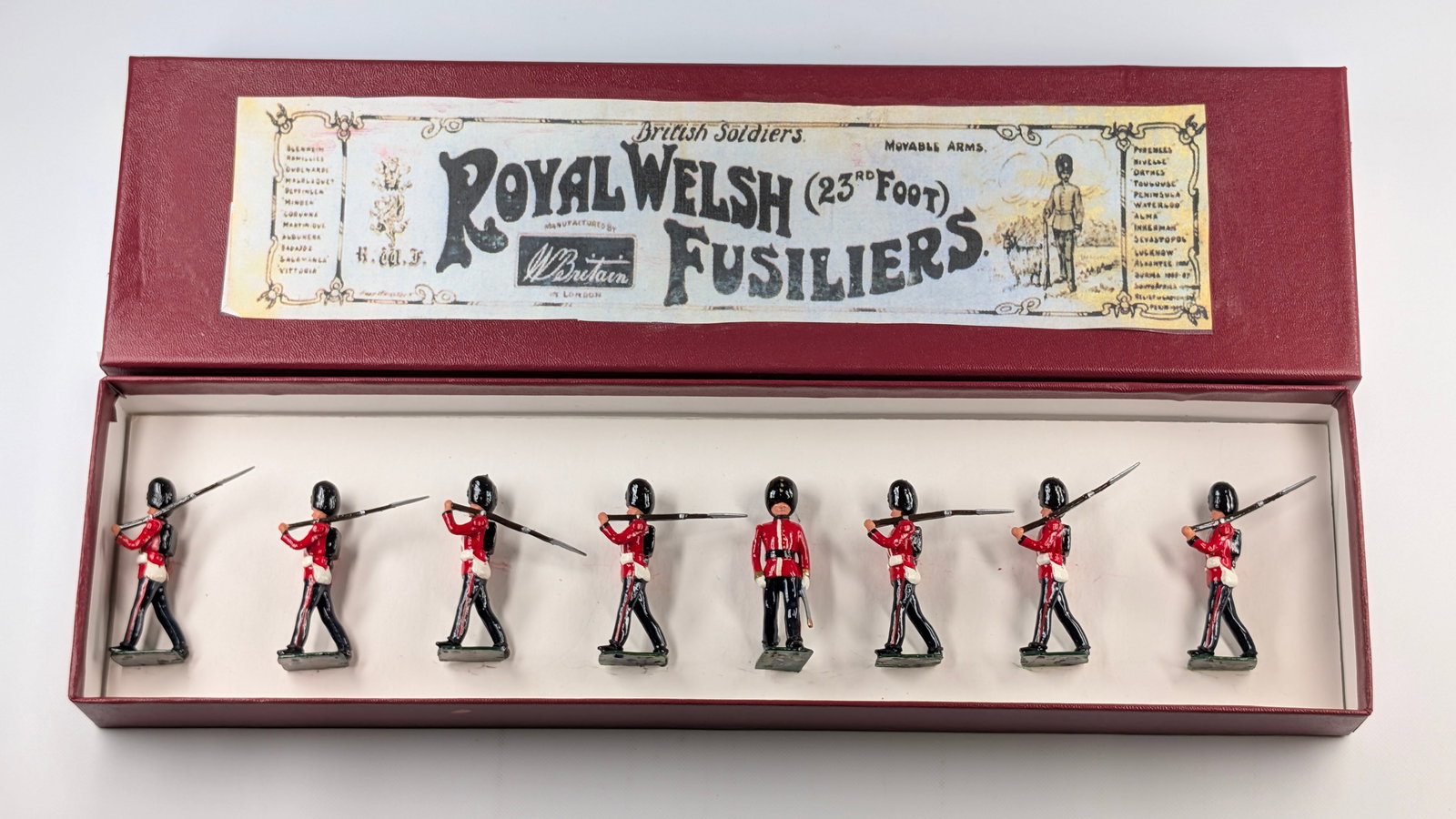 VINTAGE BRITAINS ROYAL WELSH FUSILIERS 23RD FOOT: SET REMAINS IN GOOD CONDITION, SHOWING SOME TYPICAL WEAR. CUSTOM BOX.