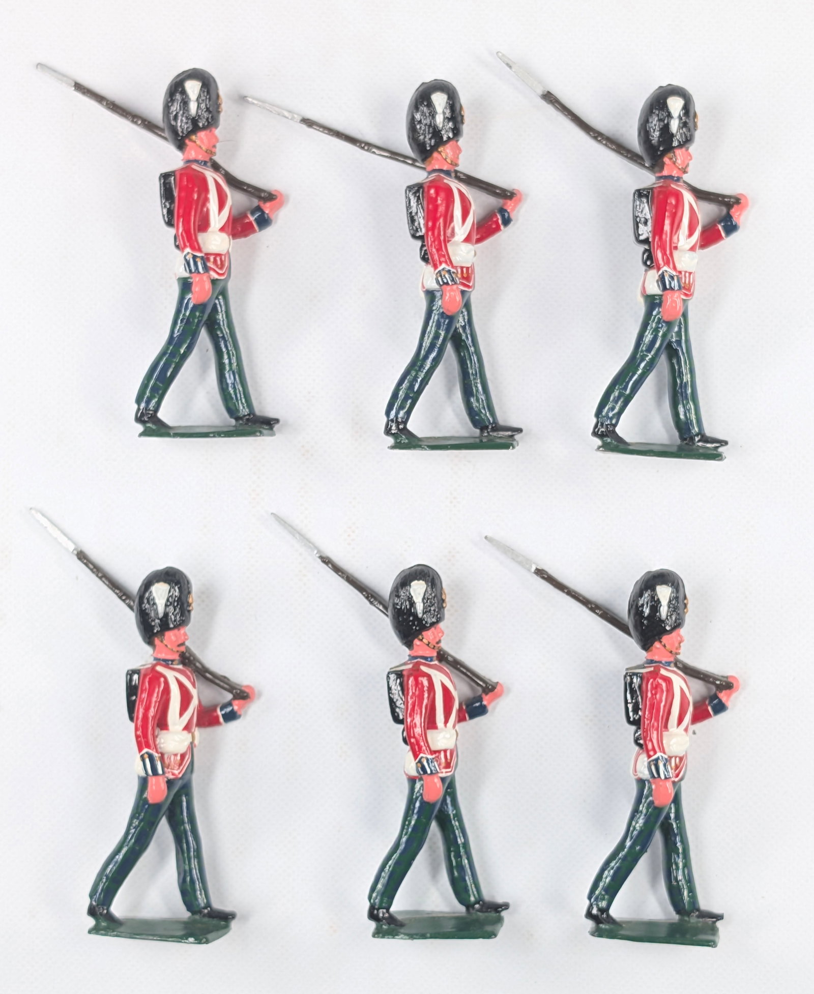 SET OF 6 VINTAGE BRITAINS GUARDS MARCHING: ALL REMAIN IN GOOD CONDITION, SHOWING SOME TYPICAL WEAR.