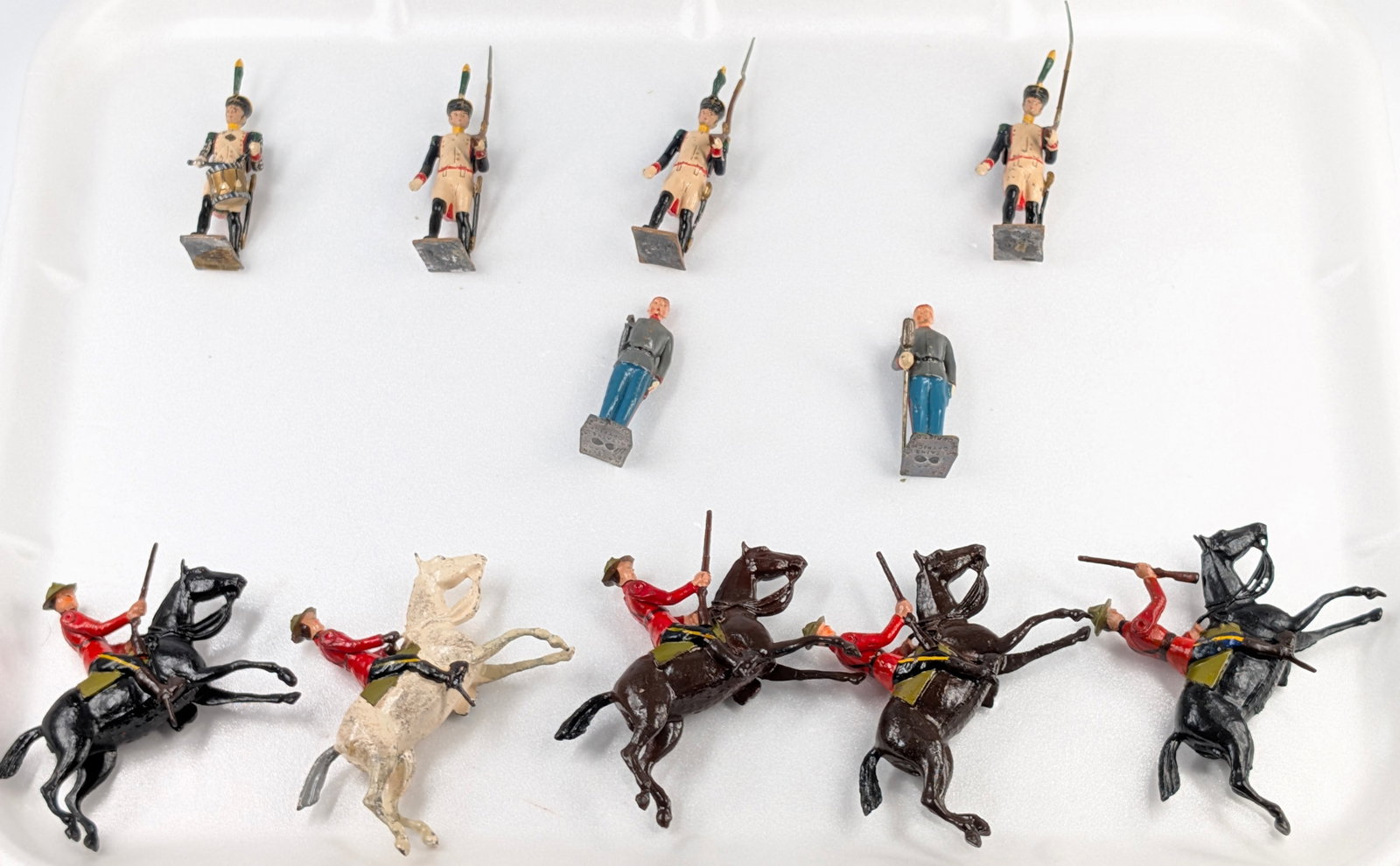 ASSORTED LOT OF VARIOUS BRITAIN SOLDIERS & RCMP: ALL REMAIN IN FAIR TO GOOD CONDITION, SHOWING SOME PAINT WEAR.