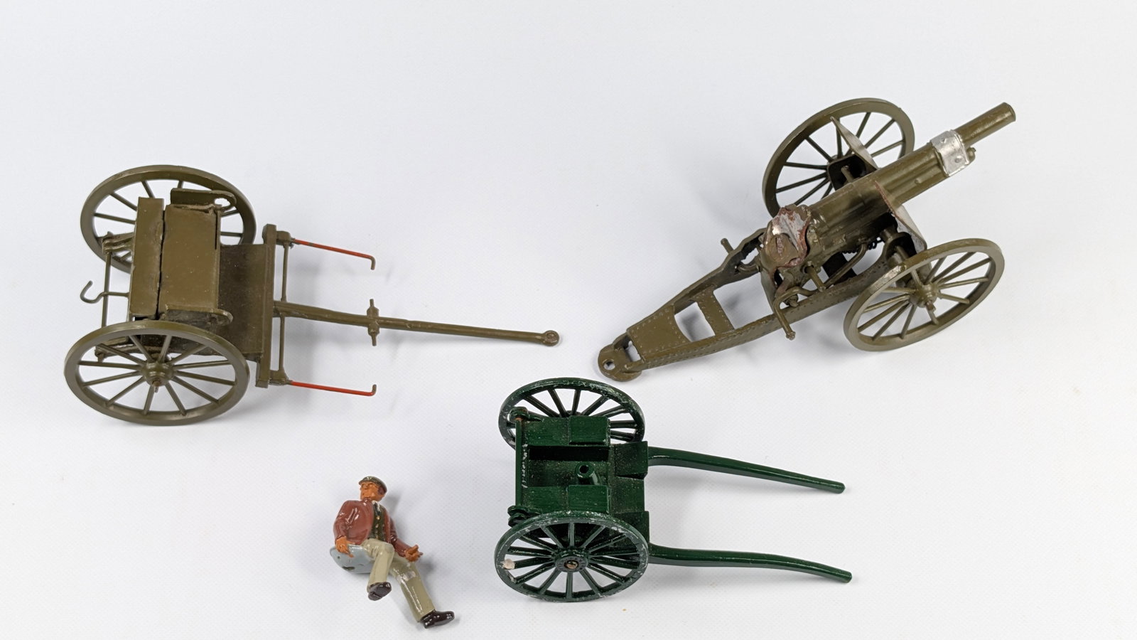 VINTAGE BRITAINS CANNON, CART, TIMBER & FIGURE: ALL REMAIN IN GOOD CONDITION, SHOWING SOME TYPICAL WEAR.