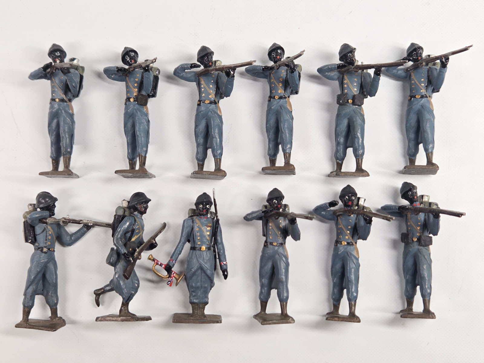 12-PIECE UNMARKED HAND PAINTED INFANTRY SOLDIERS: ALL REMAIN IN GOOD CONDITION, SHOWING SOME TYPICAL WEAR.