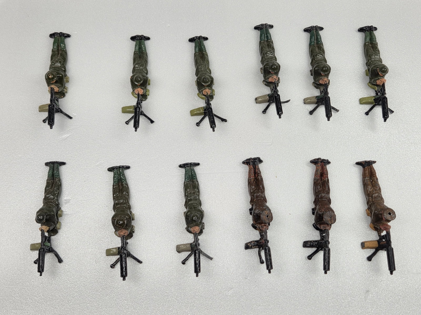 12) VINTAGE BRITAIN MACHINE GUNNERS: ALL REMAIN IN FAIR TO GOOD CONDITION, SHOWING SOME TYPICAL WEAR.