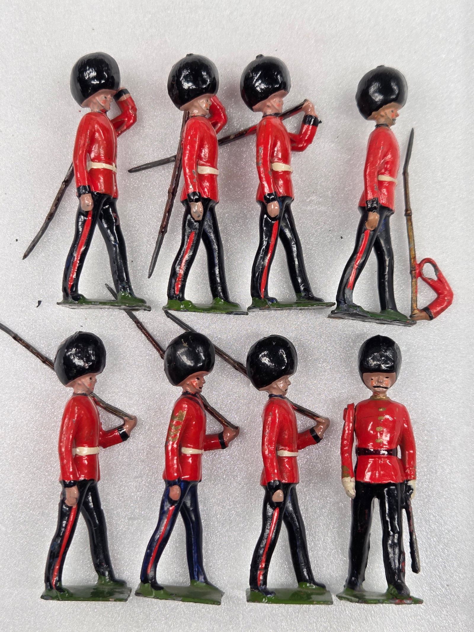 8) VINTAGE BRITAIN COLDSTREAM GUARDS: ALL REMAIN IN FAIR TO GOOD CONDITION, SHOWING SOME TYPICAL WEAR.
