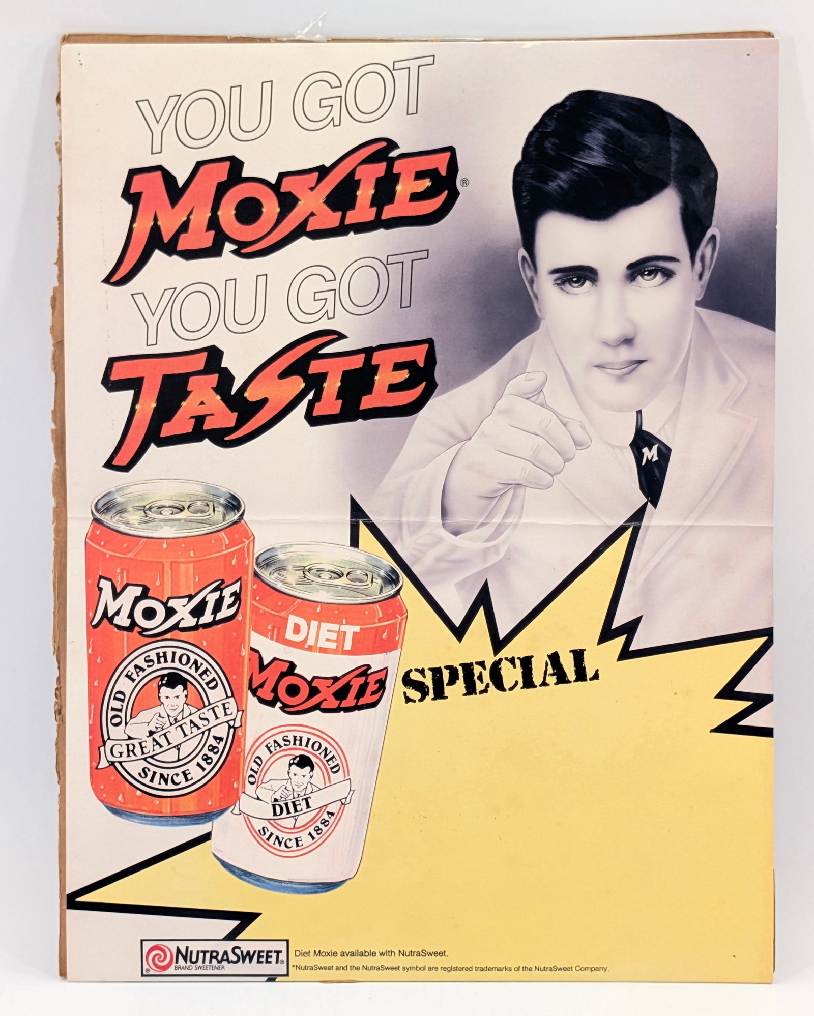 NUTRASWEET MOXIE ADVERTISING SIGN: REMAINS IN GOOD CONDITION, SHOWING SOME LIGHT WEAR.
