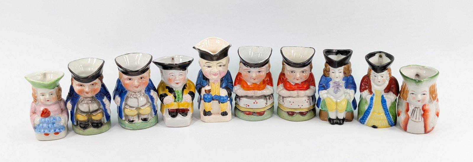 ASSORTMENT OF VARIOUS JAPAN TOBY MUG PITCHERS: ALL REMAIN IN GOOD CONDITION, SHOWING SOME TYPICAL WEAR.