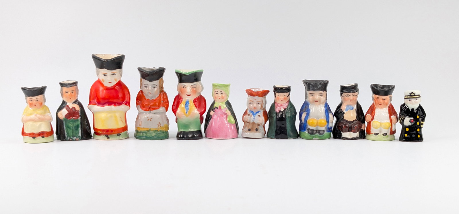 ASSORTMENT OF VARIOUS JAPAN TOBY MUG PITCHERS: ALL REMAIN IN GOOD CONDITION, SHOWING SOME TYPICAL WEAR.
