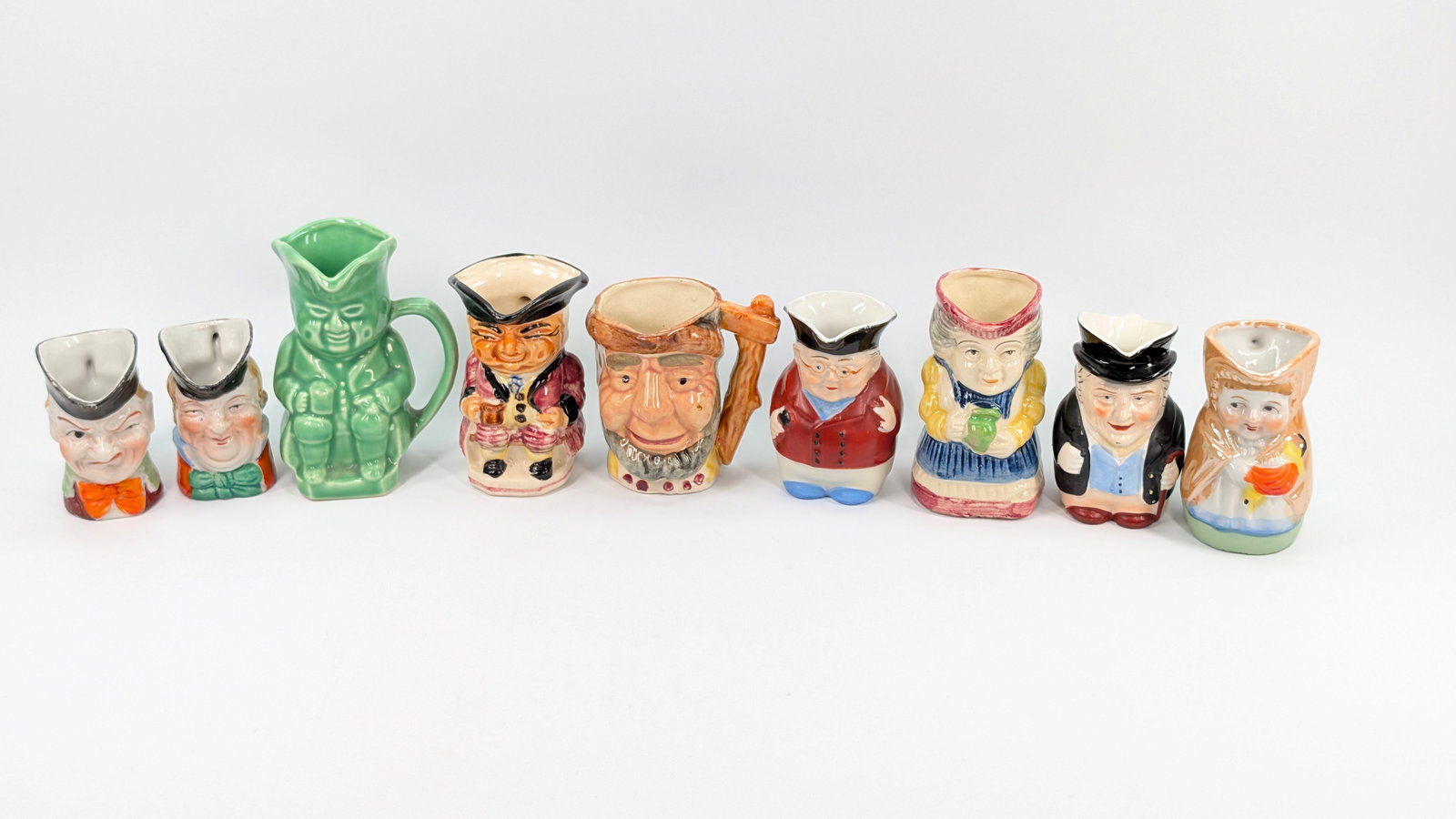 ASSORTMENT OF VARIOUS JAPAN TOBY MUG PITCHERS: ALL REMAIN IN GOOD CONDITION, SHOWING SOME TYPICAL WEAR.