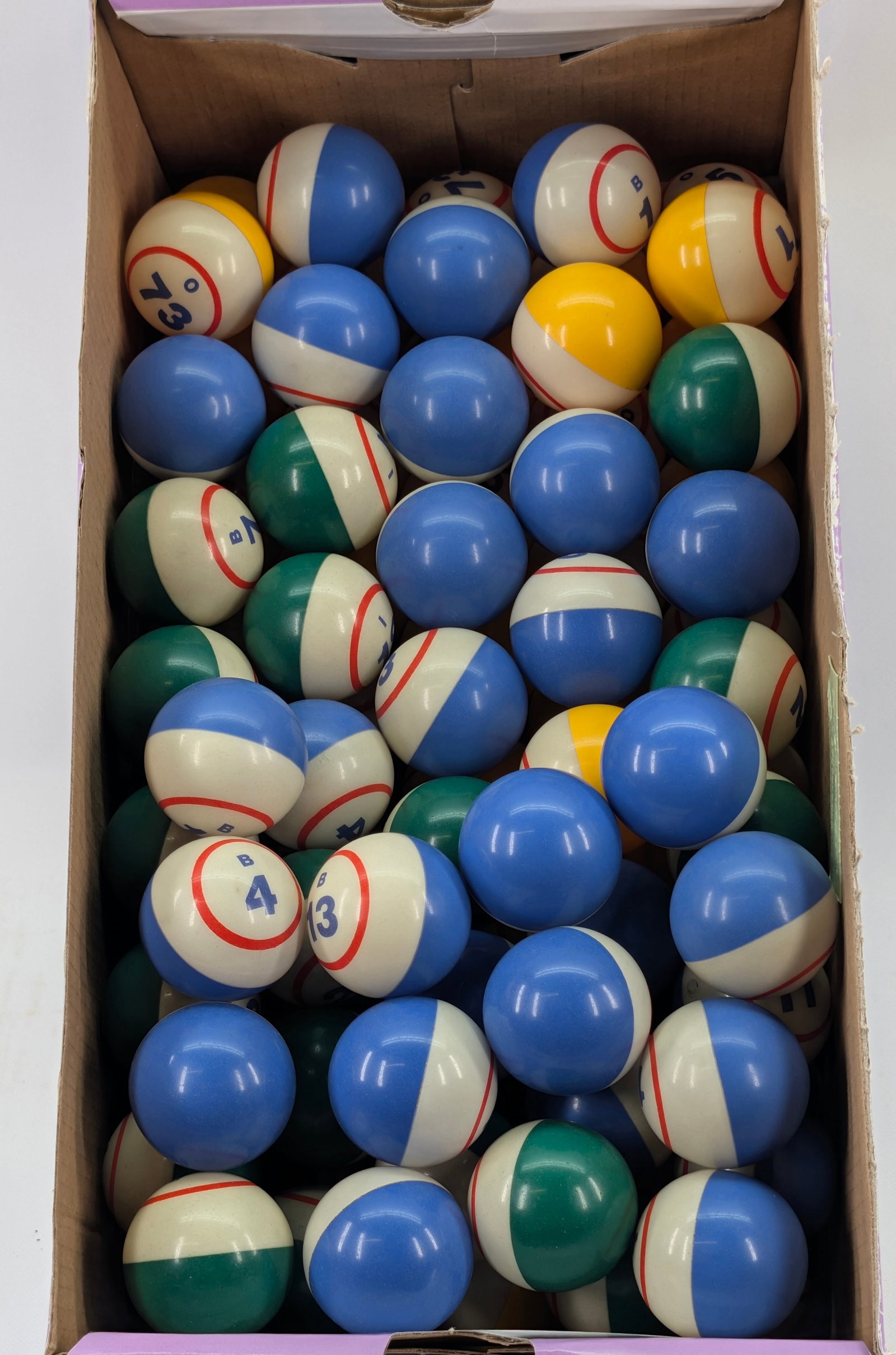 ASSORTMENT OF VARIOUS BINGO BALLS: ALL REMAIN IN GOOD CLEAN CONDITION.