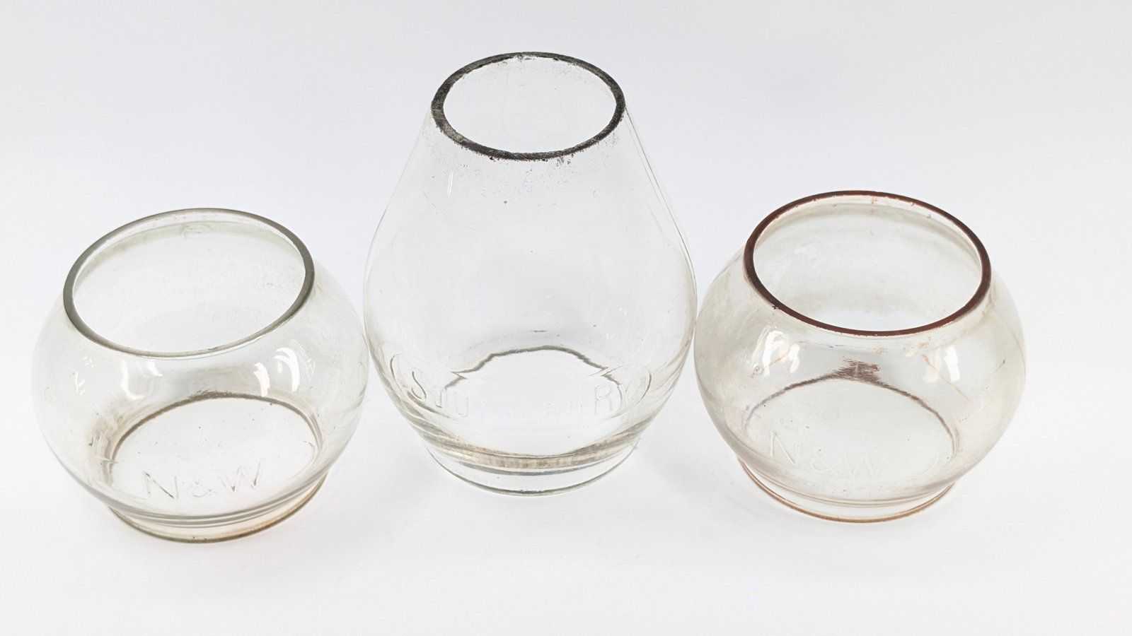 2) N&W & 1) SOUTHERN RAILWAY LANTERN GLOBES: ALL REMAIN IN GOOD CONDITION, SHOWING SOME TYPICAL WEAR.