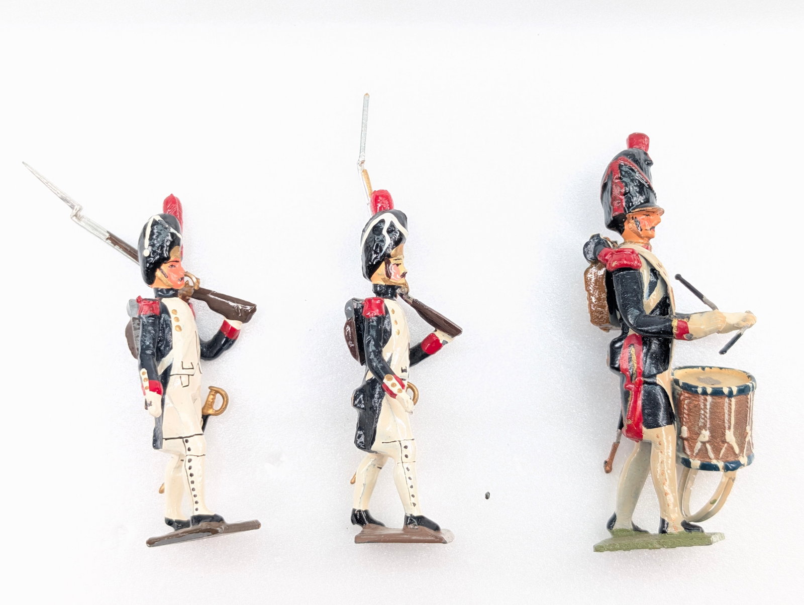 2) C.B.G. MIGNOT SOLDIERS & 1) EMPIRE SOLDIER: ALL REMAIN IN FAIR TO GOOD CONDITION, SHOWING SOME TYPICAL WEAR.