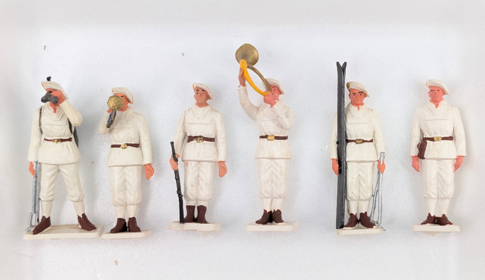 SET OF 6 PLASTIC SNOW MOUNTAIN FIGURES: ALL REMAIN IN GOOD CONDITION, SHOWING SOME TYPICAL WEAR.