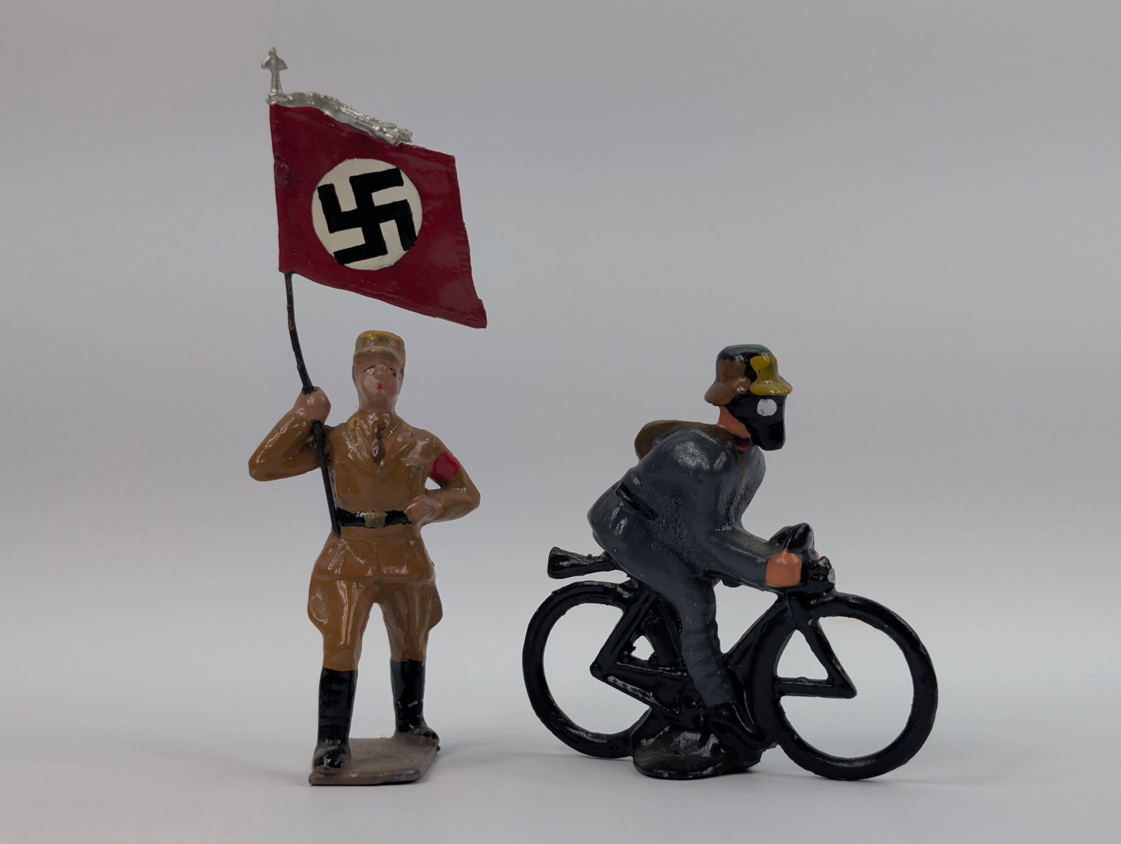 2) CUSTOM PAINTED LEAD GERMAN SOLDIERS: BOTH REMAIN IN GOOD CONDITION, SHOWING SOME PAINT WEAR.