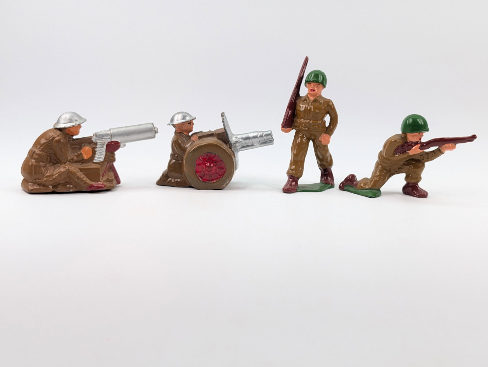 4) BARCLAY / MANOIL LEAD SOLDIERS: ALL REMAIN IN FAIR TO GOOD CONDITION, SHOWING SOME TYPICAL WEAR.