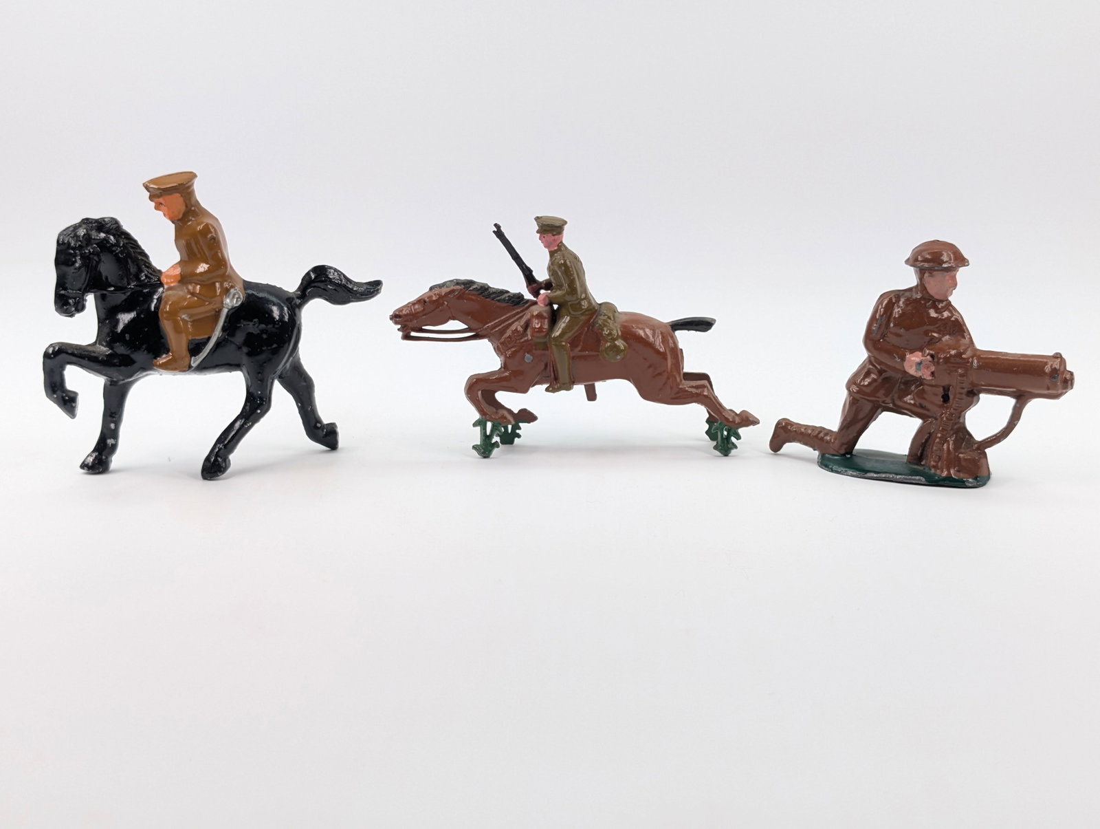 3) BARCLAY / MANOIL LEAD SOLDIERS: ALL REMAIN IN GOOD CONDITION, SHOWING SOME TYPICAL WEAR.