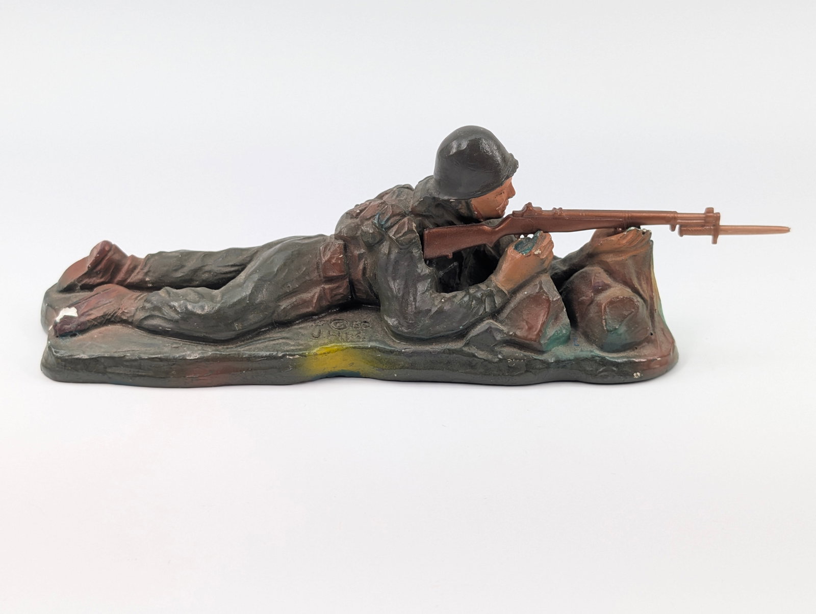 J.H. MILLER SOLDIER W/ RIFLE: REMAINS IN GOOD CONDITION, SHOWING SOME LIGHT TYPICAL WEAR.