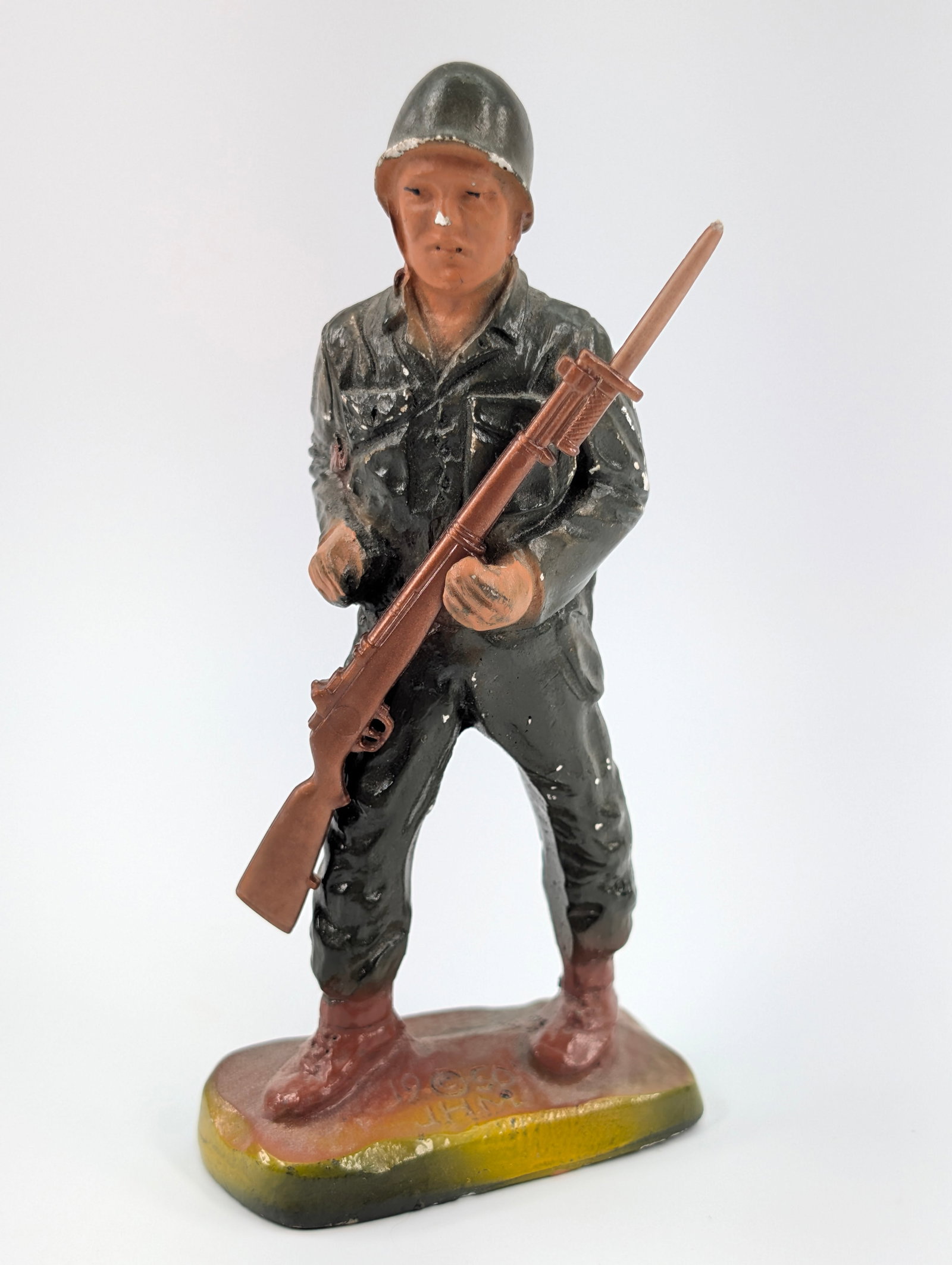 J.H. MILLER SOLDIER W/ RIFLE: REMAINS IN GOOD CONDITION, SHOWING SOME LIGHT WEAR. LOOSE RIFLE.