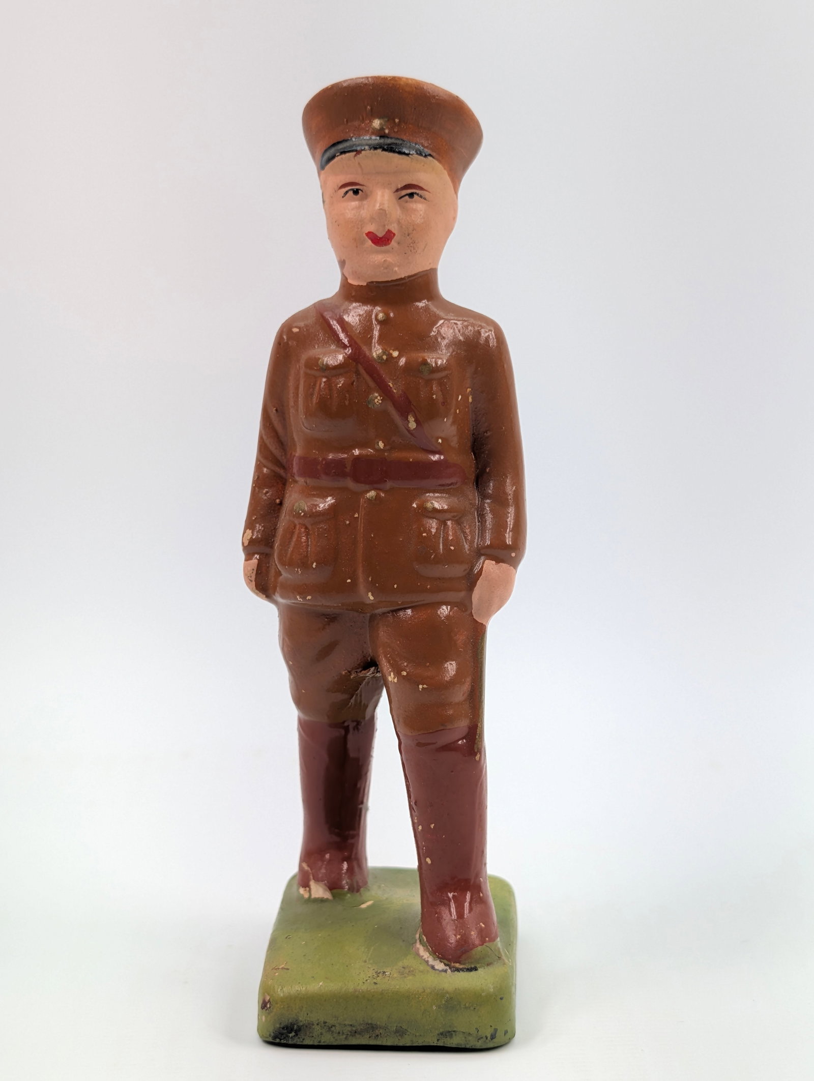VINTAGE JAPAN PAINTED CERAMIC SOLDIER: REMAINS IN GOOD CONDITION, SHOWING SOME LIGHT PAINT WEAR.