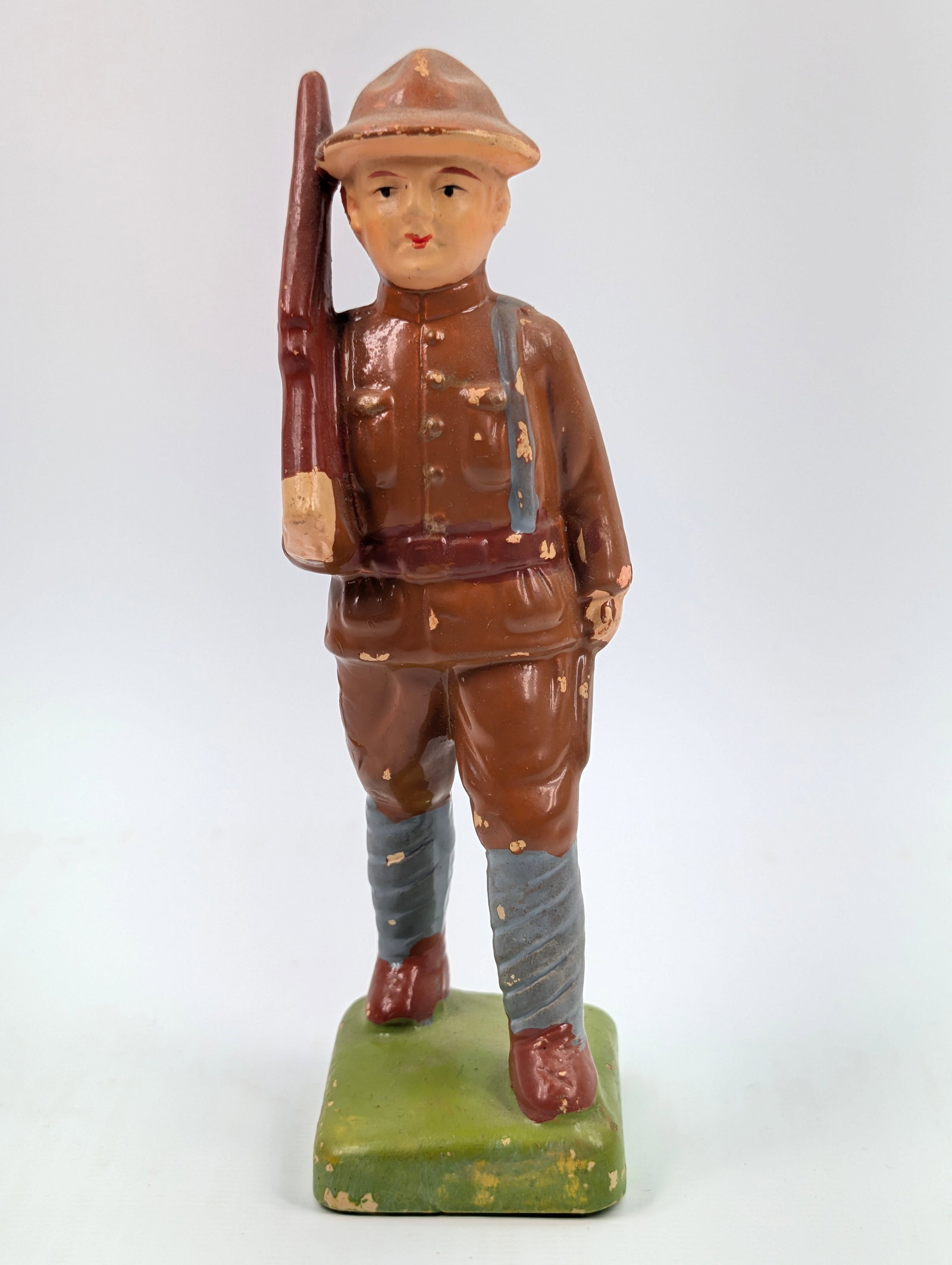 VINTAGE JAPAN PAINTED CERAMIC SOLDIER: REMAINS IN GOOD CONDITION, SHOWING SOME LIGHT PAINT WEAR.