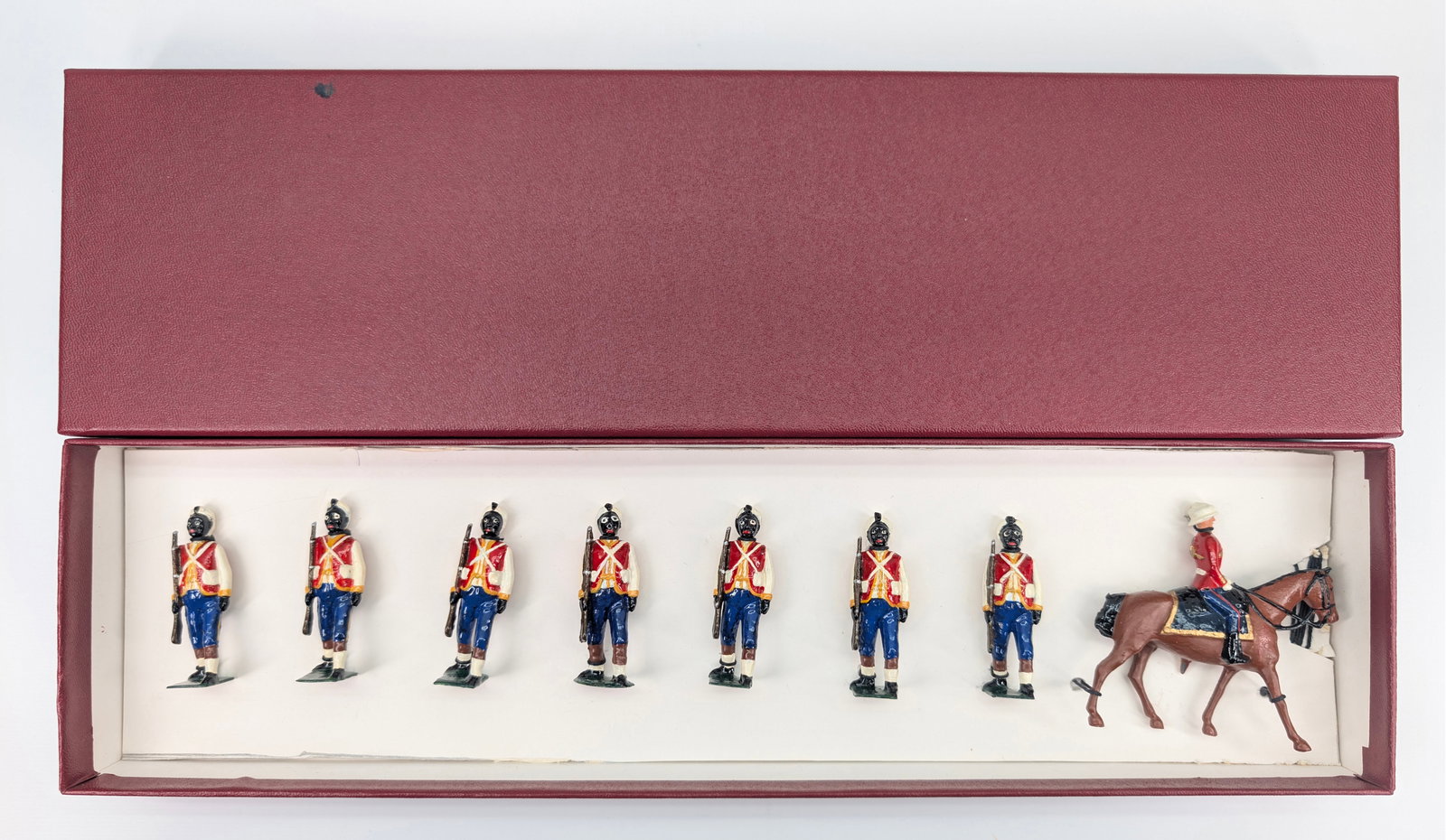 SET OF 8 VINTAGE BRITAIN SOLDIER REPAINT: ALL REMAIN IN GOOD REPAINT CONDITION. CUSTOM BOX.