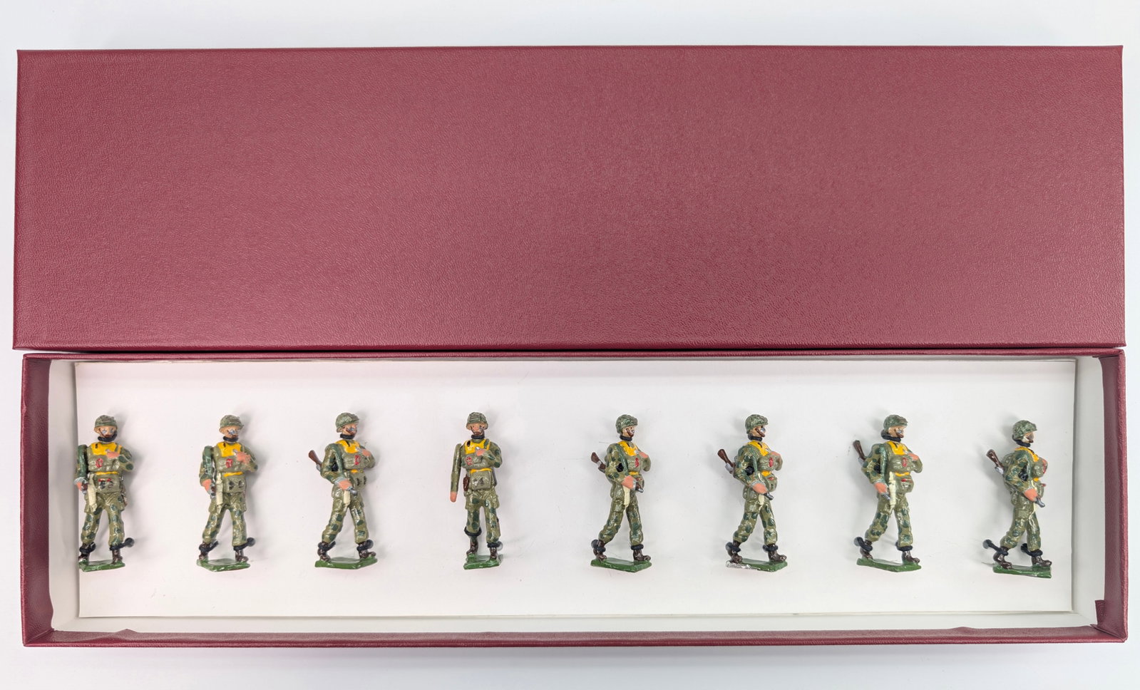 SET OF 8 UNMARKED HAND PAINTED PARATROOPERS: ALL REMAIN IN VERY GOOD CONDITION WITH CUSTOM BOX.