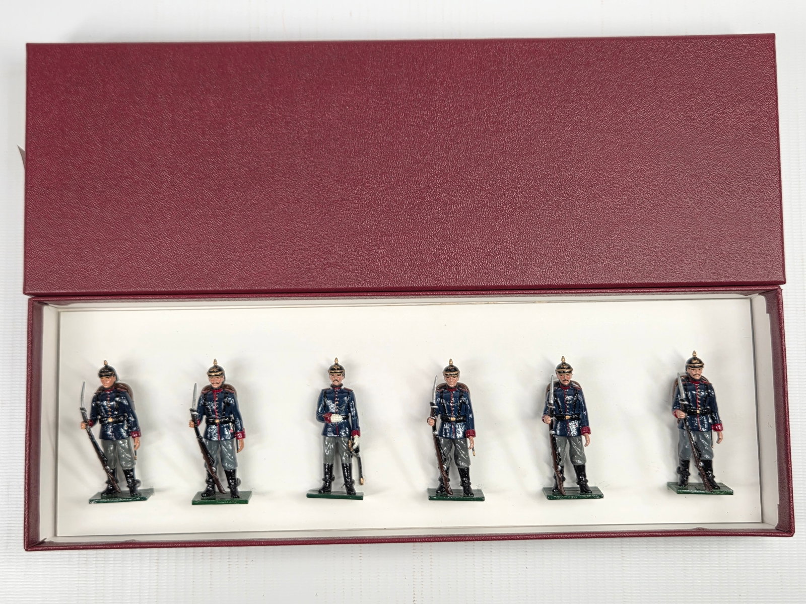 SET OF 6 PICKELHAUBE HAND PAINTED SOLDIERS: ALL REMAIN IN GOOD CONDITION, SHOWING SOME LIGHT TYPICAL WEAR. CUSTOM BOX.