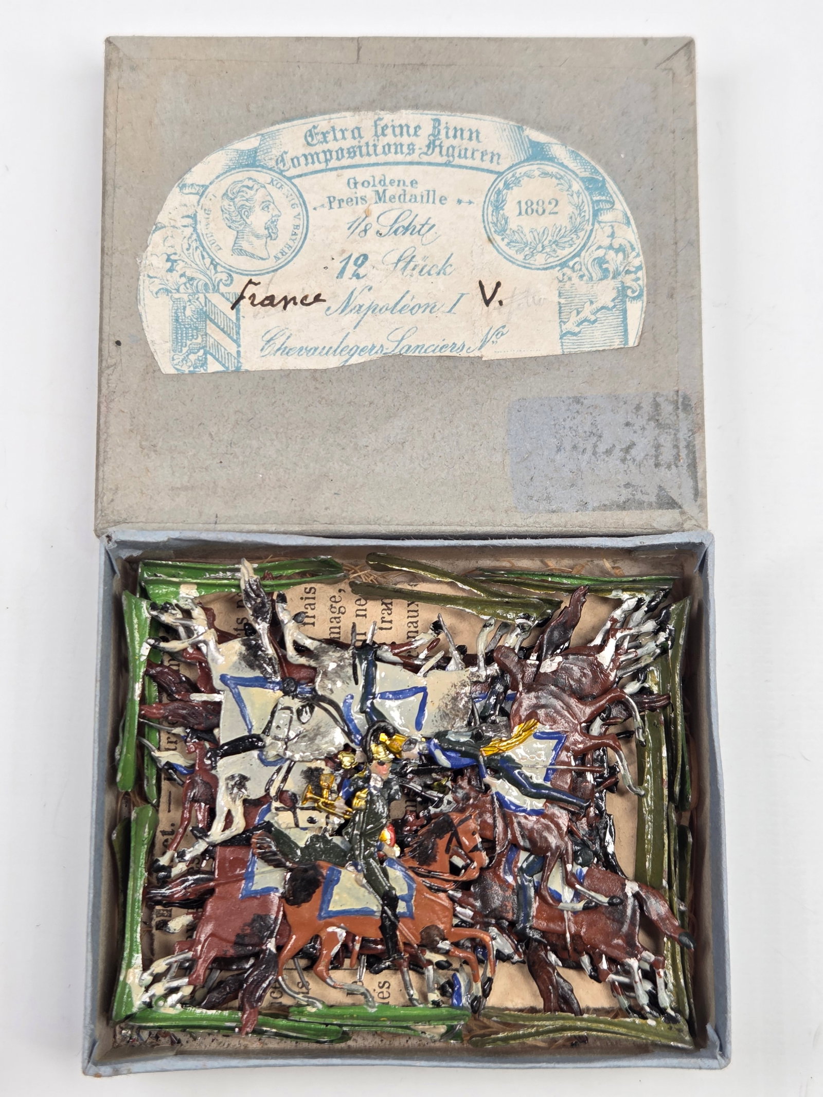 ANTIQUE ERNST HEINRICHSEN GERMAN FLAT SOLDIERS W/ BOX: ALL REMAIN IN FAIR TO GOOD CONDITION, SHOWING SOME LIGHT TYPICAL WEAR. ORIGINAL BOX REMAINS IN FAIR TO GOOD CONDITION, SHOWING STORAGE WEAR.