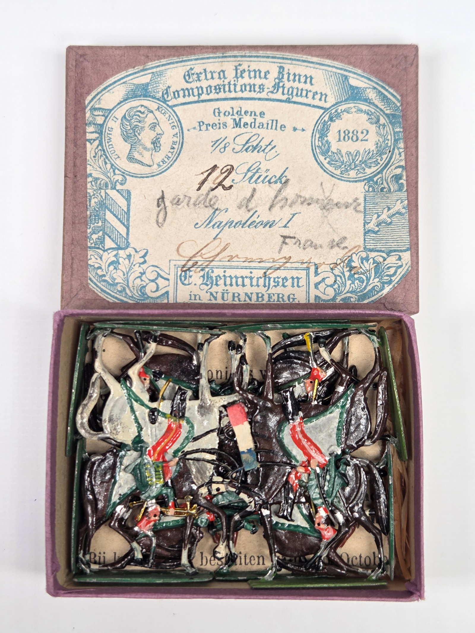 ANTIQUE ERNST HEINRICHSEN GERMAN FLAT SOLDIERS W/ BOX: ALL REMAIN IN FAIR TO GOOD CONDITION, SHOWING SOME LIGHT TYPICAL WEAR. ORIGINAL BOX REMAINS IN FAIR TO GOOD CONDITION, SHOWING STORAGE WEAR.