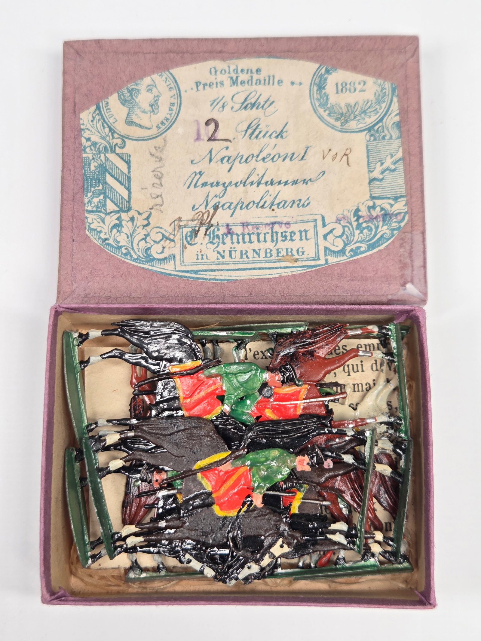 ANTIQUE ERNST HEINRICHSEN GERMAN FLAT SOLDIERS W/ BOX: ALL REMAIN IN FAIR TO GOOD CONDITION, SHOWING SOME LIGHT TYPICAL WEAR. ORIGINAL BOX REMAINS IN FAIR TO GOOD CONDITION, SHOWING STORAGE WEAR.