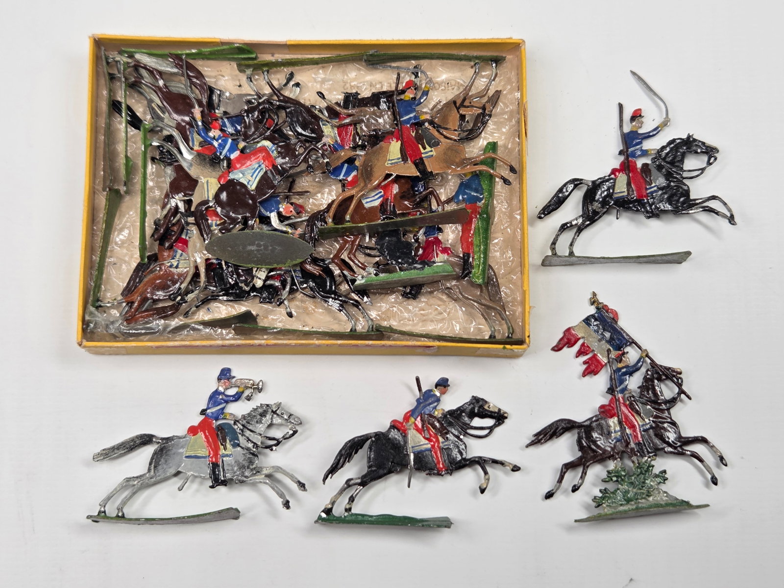 ANTIQUE ERNST HEINRICHSEN GERMAN FLAT SOLDIERS W/ BOX: ALL REMAIN IN FAIR TO GOOD CONDITION, SHOWING SOME LIGHT TYPICAL WEAR. ORIGINAL BOX REMAINS IN FAIR TO GOOD CONDITION, SHOWING STORAGE WEAR.