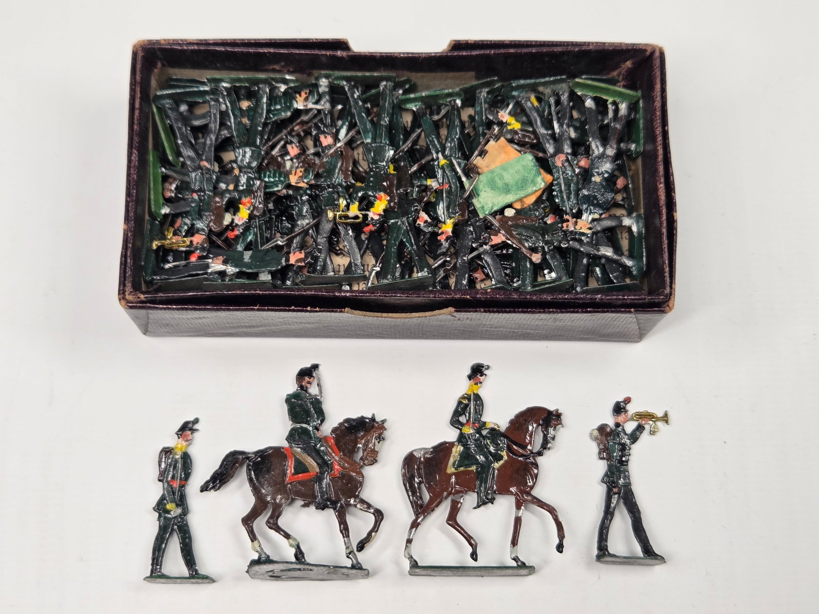 ANTIQUE ERNST HEINRICHSEN GERMAN FLAT SOLDIERS W/ BOX: ALL REMAIN IN FAIR TO GOOD CONDITION, SHOWING SOME LIGHT TYPICAL WEAR. ORIGINAL BOX REMAINS IN FAIR TO GOOD CONDITION, SHOWING STORAGE WEAR.