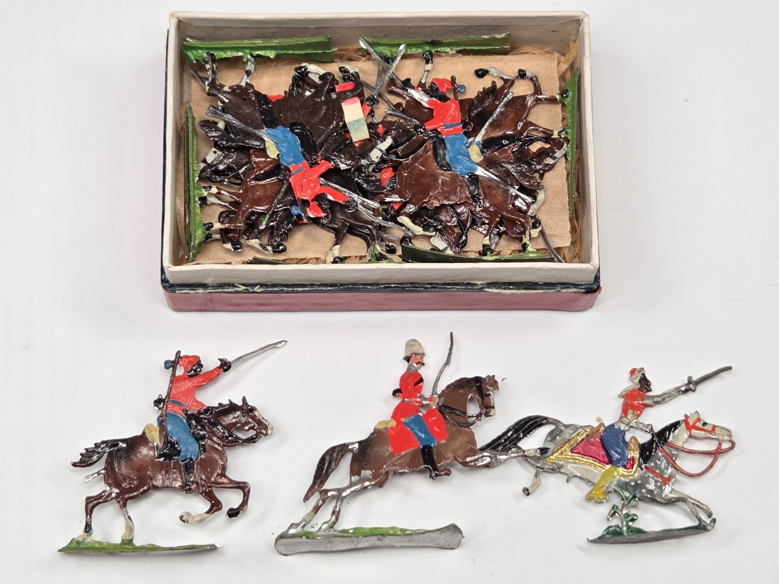 ANTIQUE ERNST HEINRICHSEN GERMAN FLAT SOLDIERS W/ BOX: ALL REMAIN IN FAIR TO GOOD CONDITION, SHOWING SOME LIGHT TYPICAL WEAR. ORIGINAL BOX REMAINS IN FAIR TO GOOD CONDITION, SHOWING STORAGE WEAR.