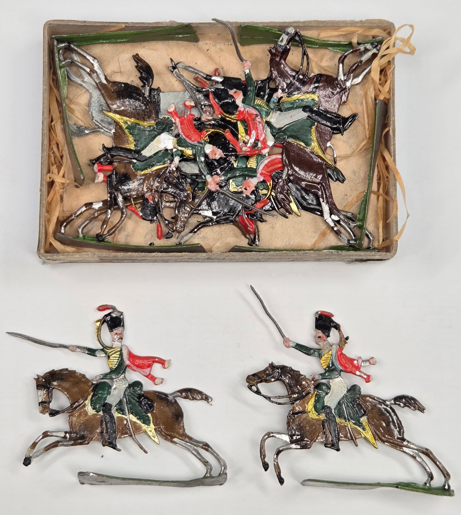 ANTIQUE ERNST HEINRICHSEN GERMAN FLAT SOLDIERS W/ BOX: ALL REMAIN IN FAIR TO GOOD CONDITION, SHOWING SOME LIGHT TYPICAL WEAR. ORIGINAL BOX REMAINS IN FAIR TO GOOD CONDITION, SHOWING STORAGE WEAR.