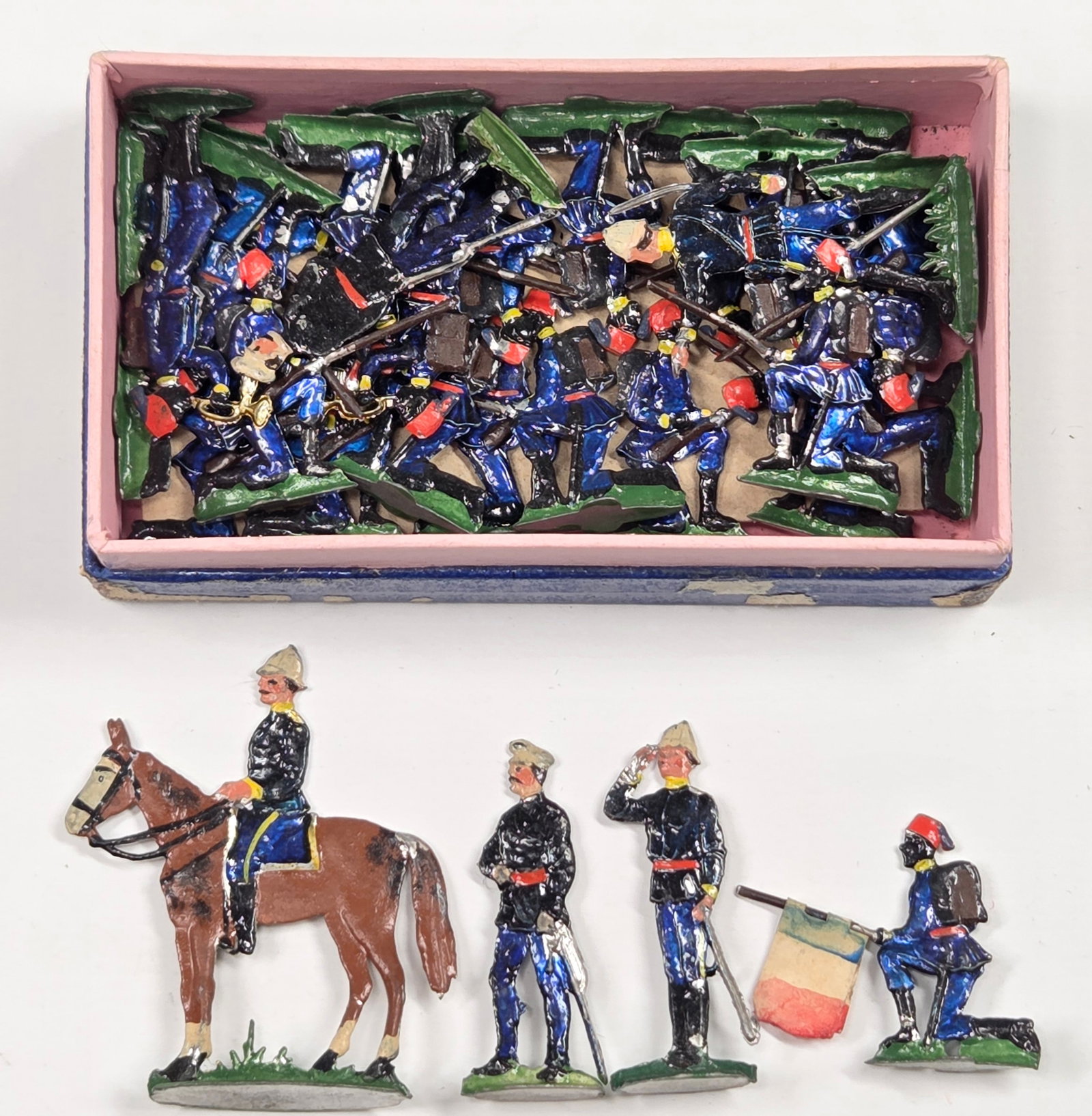 ANTIQUE ERNST HEINRICHSEN GERMAN FLAT SOLDIERS W/ BOX: ALL REMAIN IN FAIR TO GOOD CONDITION, SHOWING SOME LIGHT TYPICAL WEAR. ORIGINAL BOX REMAINS IN FAIR TO GOOD CONDITION, SHOWING STORAGE WEAR.