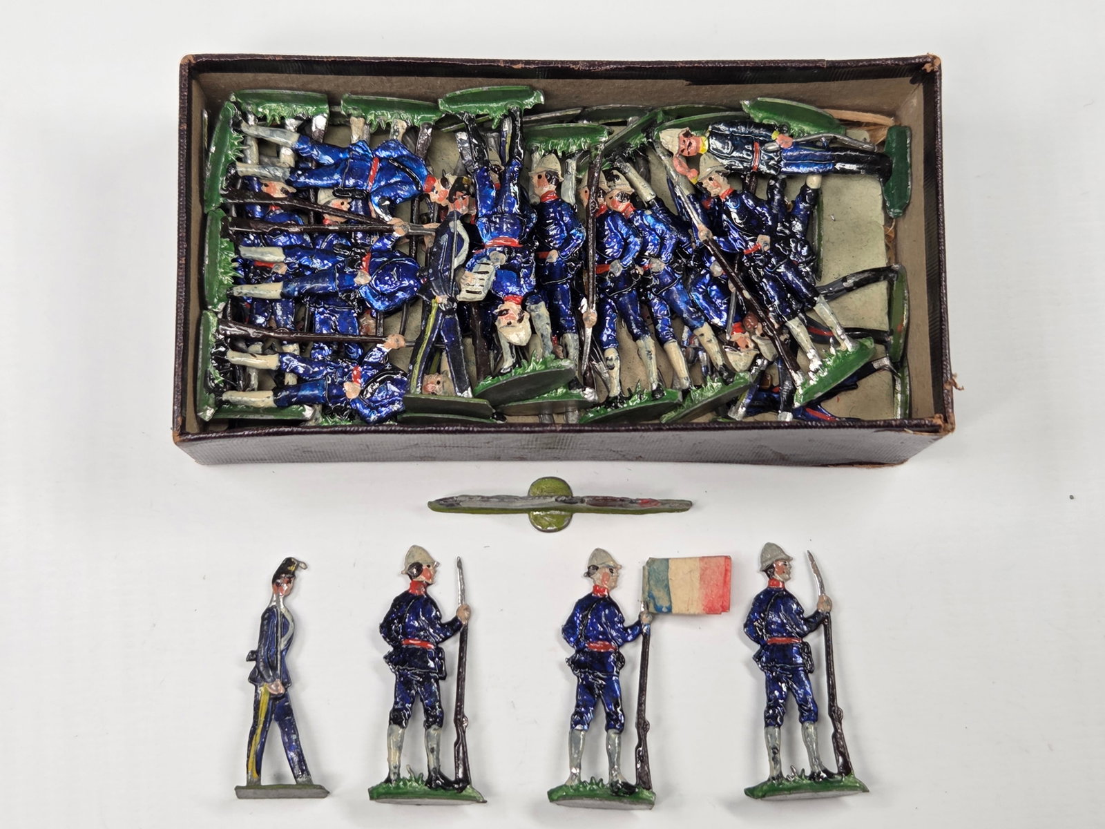 ANTIQUE ERNST HEINRICHSEN GERMAN FLAT SOLDIERS W/ BOX: ALL REMAIN IN FAIR TO GOOD CONDITION, SHOWING SOME LIGHT TYPICAL WEAR. ORIGINAL BOX REMAINS IN FAIR TO GOOD CONDITION, SHOWING STORAGE WEAR.