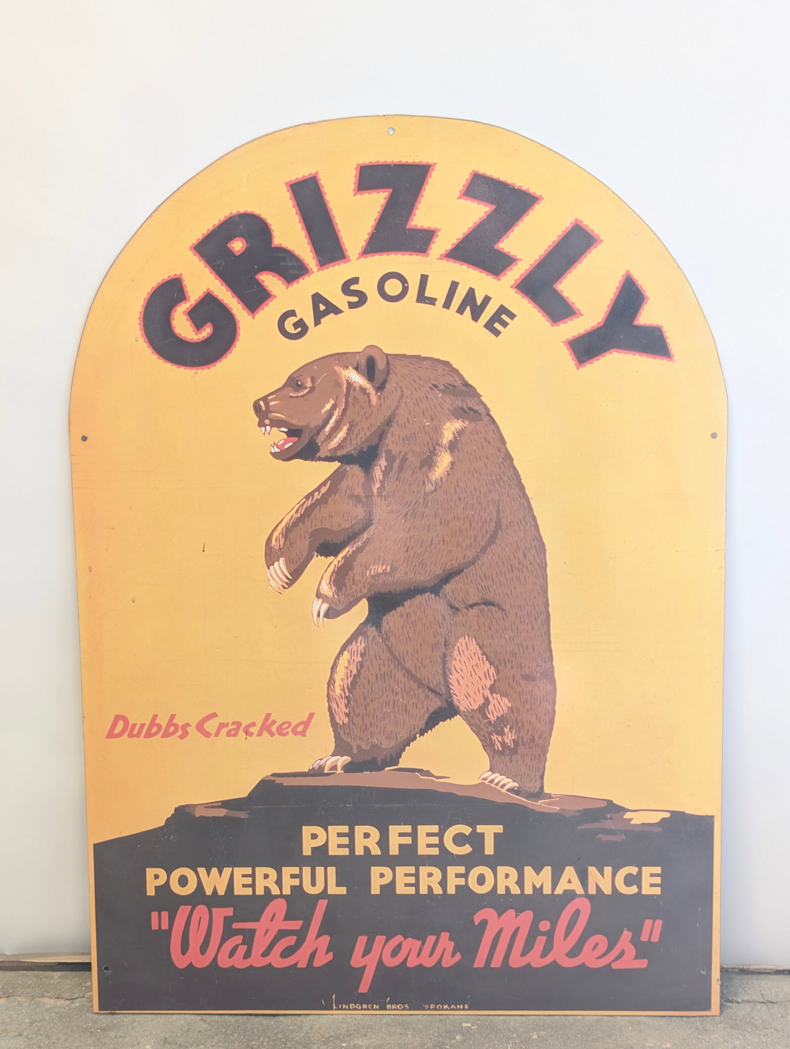 REPRODUCTION 34" METAL GRIZZLY GASOLINE SIGN: REPRODUCTION SIGN REMAINS IN GOOD CONDITION, SHOWING SOME TYPICAL WEAR.