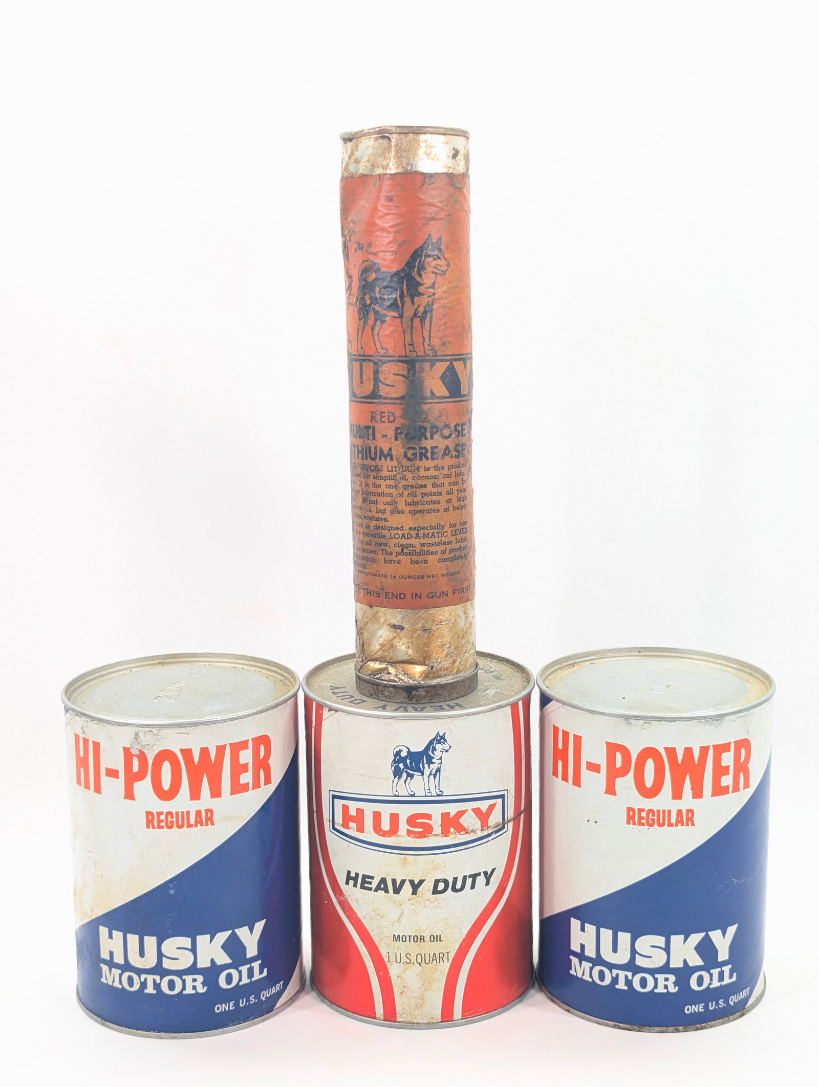 3) HUSKY MOTOR OIL ONE QUART CANS & GREASE TUBE: CANS REMAIN IN GOOD CONDITION, SHOWING SOME TYPICAL WEAR. GREASE TUBE SHOWING WEAR THROUGHOUT.