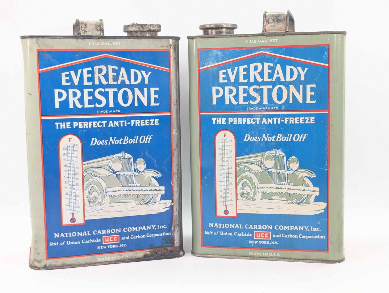 2) ANTIQUE EVEREADY PRESTONE 1 GALLON ANTIFREEZE: BOTH REMAIN IN GOOD CONDITION, SHOWING TYPICAL WEAR.