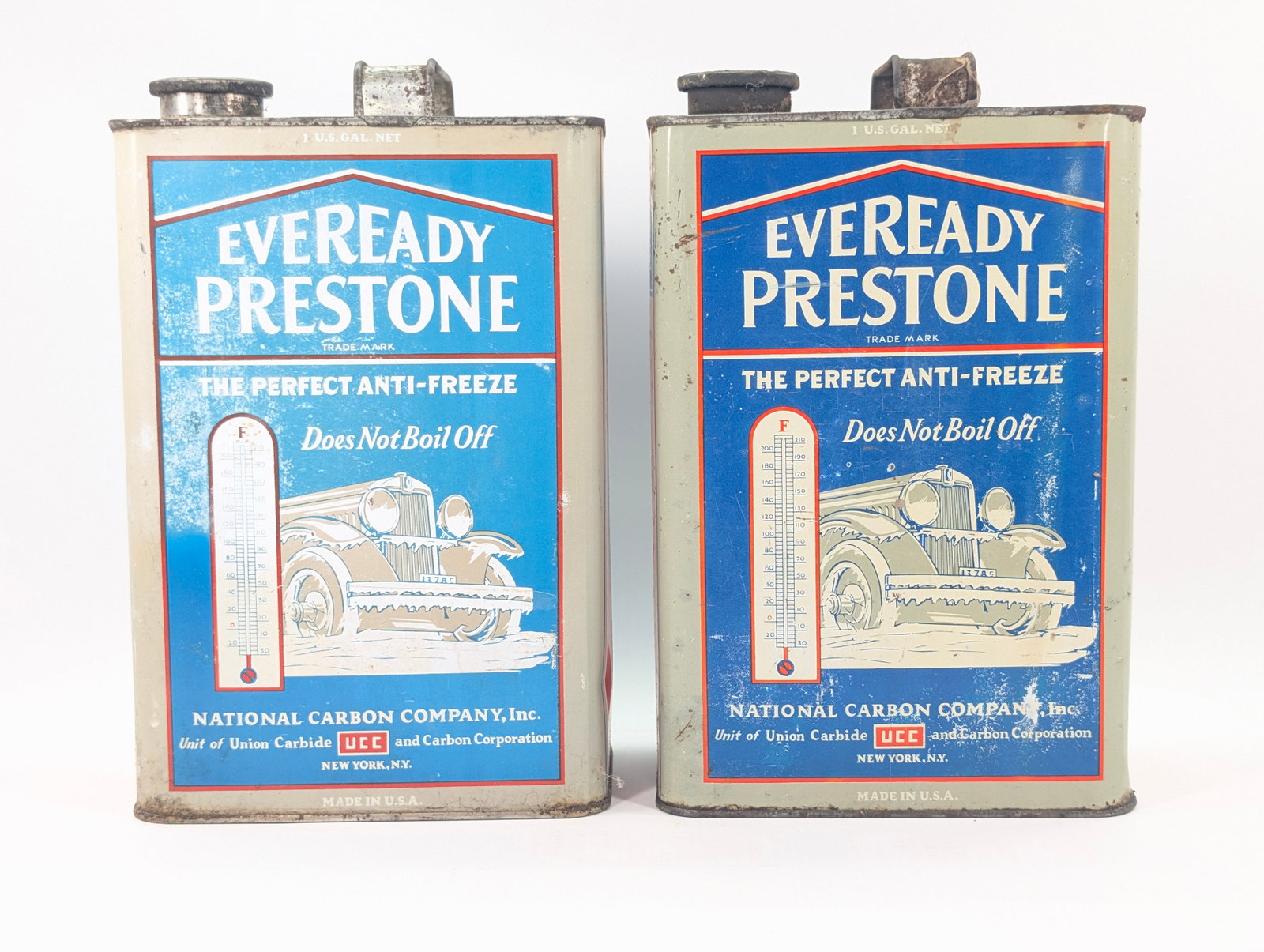 2) ANTIQUE EVEREADY PRESTONE 1 GALLON ANTIFREEZE: BOTH REMAIN IN GOOD CONDITION, SHOWING TYPICAL WEAR.