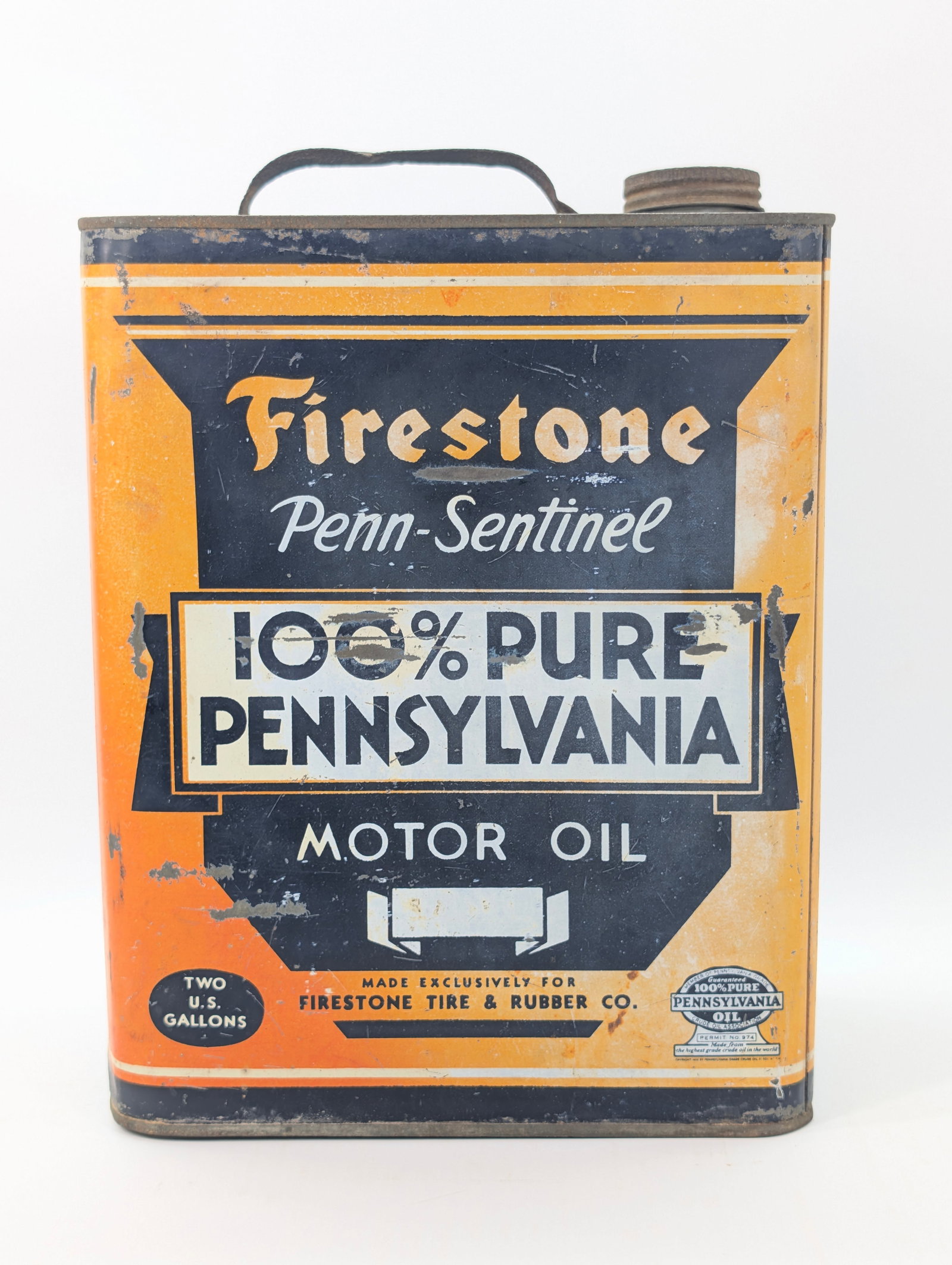 FIRESTONE 100% PURE PENNSYLVANIA MOTOR OIL TWO GAL. CAN: REMAINS IN FAIR CONDITION, SHOWING TYPICAL WEAR. THROUGHOUT.