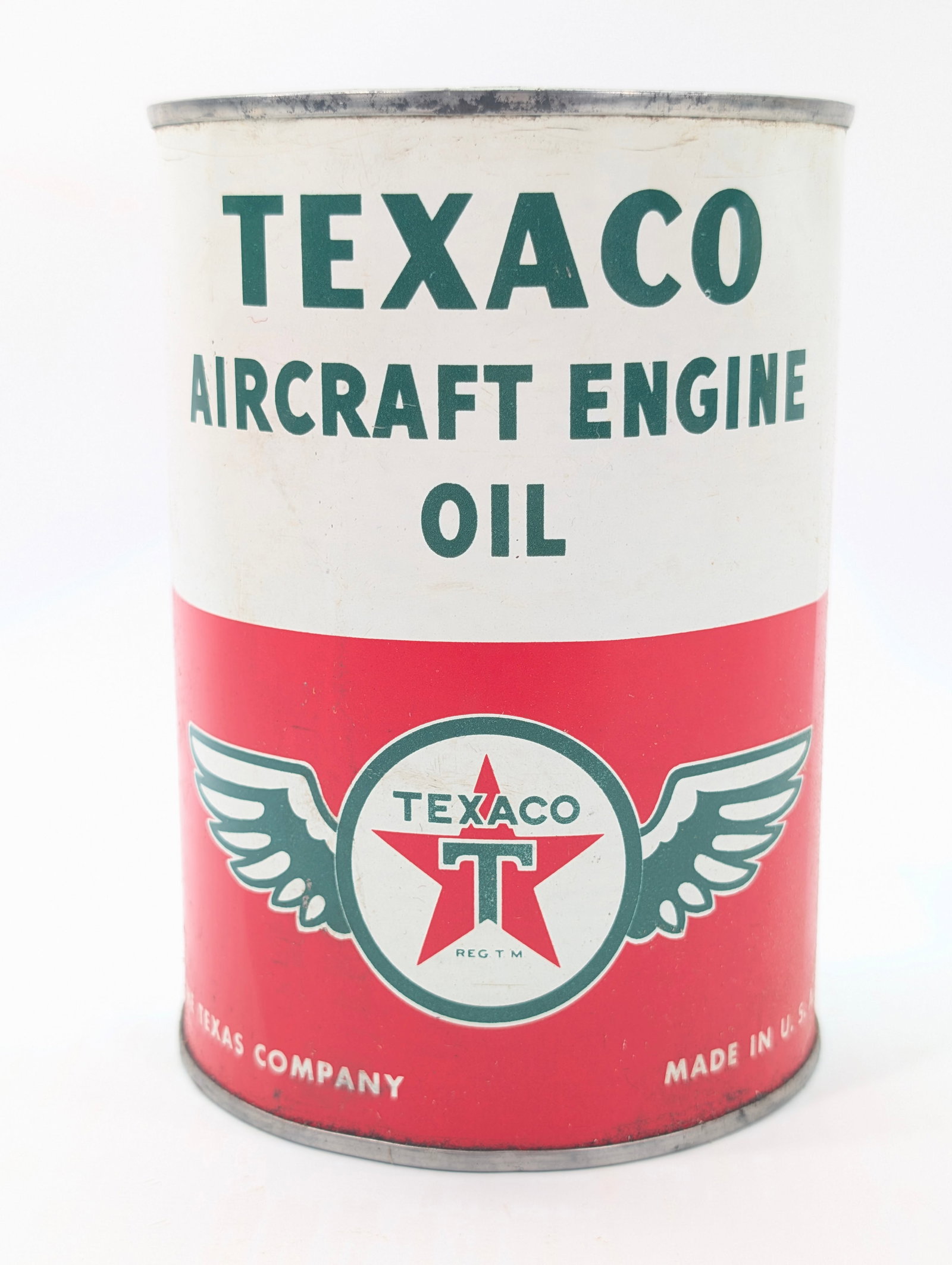 TEXACO AIRCRAFT ENGINE OIL ONE QUART CAN: REMAINS IN GOOD CONDITION, SHOWING SOME TYPICAL WEAR.