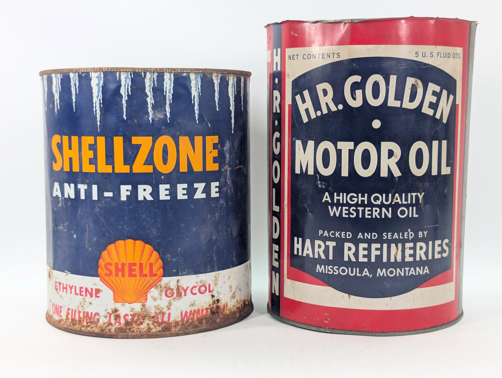 SHELLZONE ANTIFREEZE & H.R. GOLDEN MOTOR OIL CAN: BOTH REMAIN IN FAIR CONDITION, SHOWING WEAR THROUGHOUT. SHELL SHOWING RUST. GOLDEN MOTOR OIL WITH TOP CUT OFF.