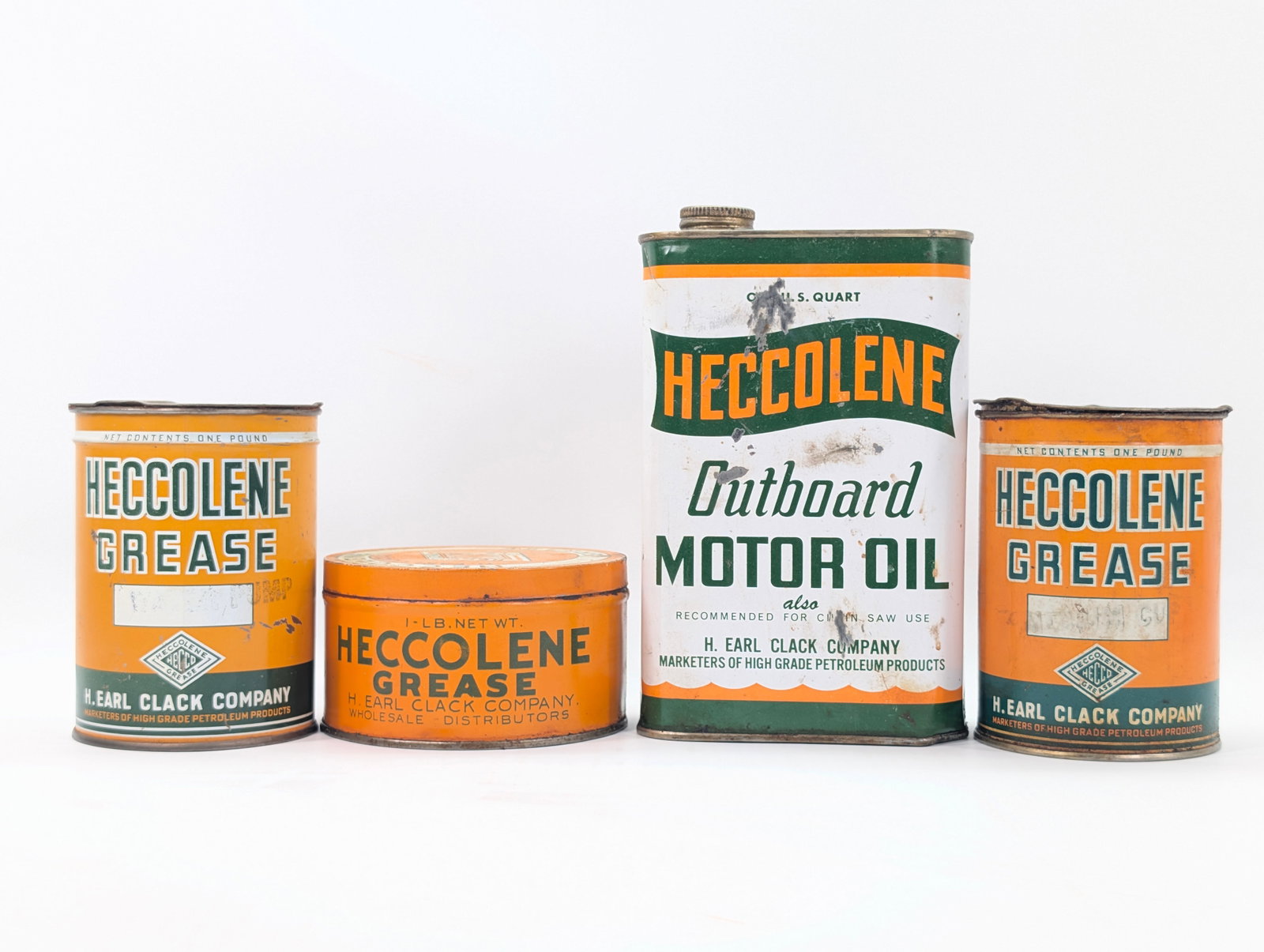 4) HECCOLENE GREASE & MOTOR OIL CANS: VARIOUS SIZE CANS ALL REMAIN IN GOOD CONDITION, SHOWING SOME TYPICAL WEAR.