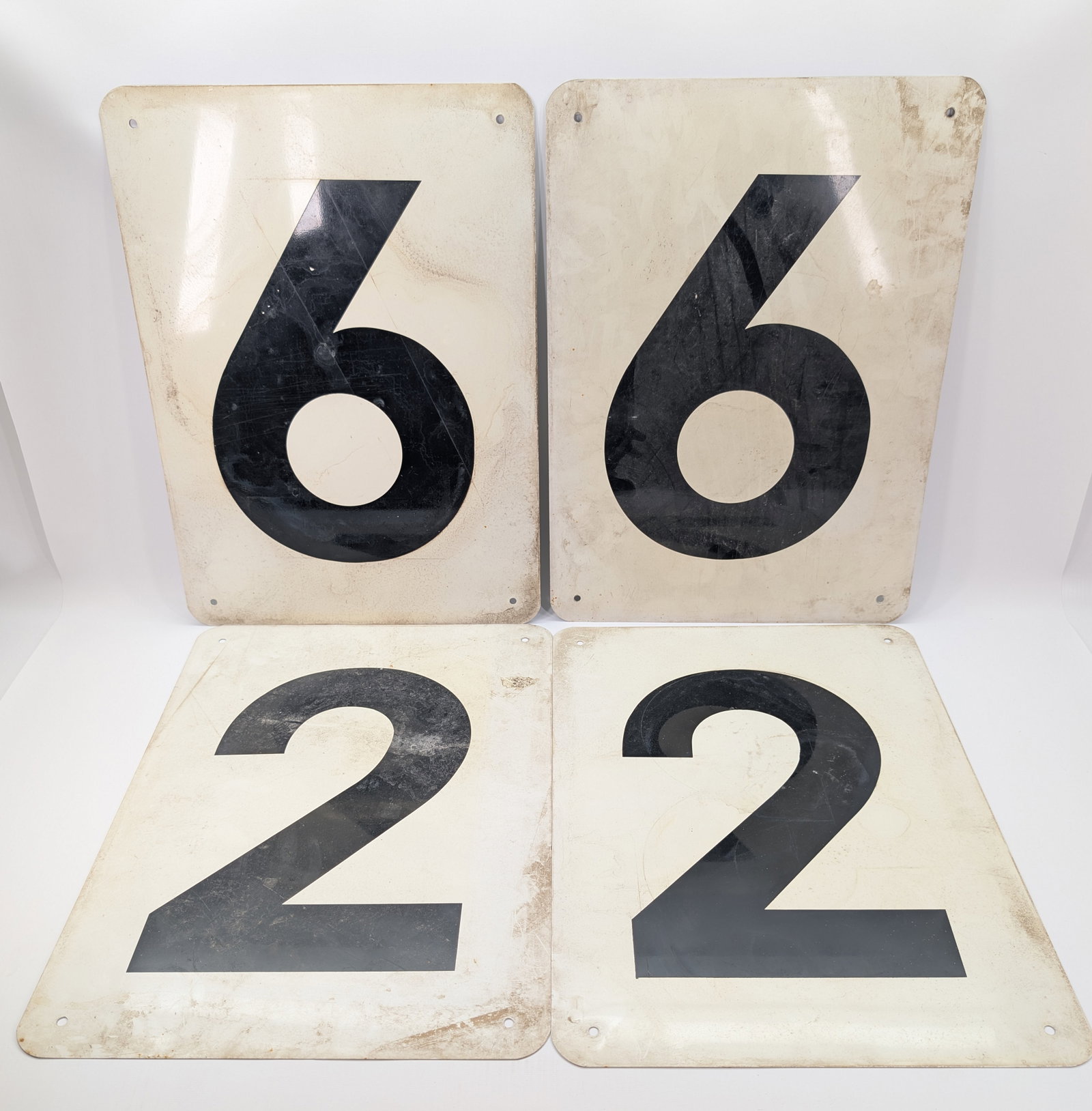 4) VINTAGE METAL GAS STATION NUMBER SIGNS: ALL REMAIN IN GOOD CONDITION, SHOWING SOME TYPICAL WEAR.
