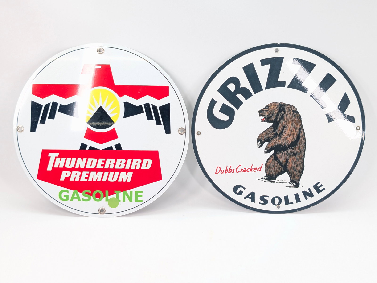 REPRODUCTION GRIZZLY & THUNDERBIRD GASOLINE SIGNS: BOTH REPRODUCTION SIGNS REMAIN IN GOOD CONDITION.