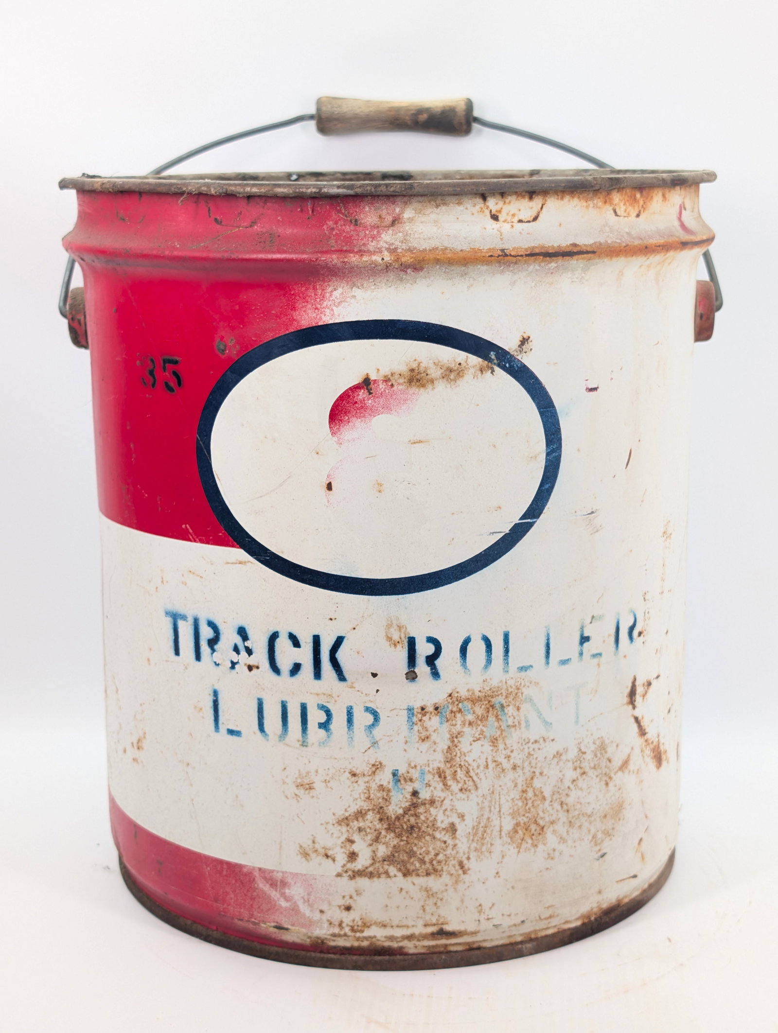 ESSO TRACK ROLLER LUBRICANT 35 POUND BUCKET: REMAINS IN POOR CONDITION, SHOWING WEAR THROUGHOUT WITH COLOR FADING. CONTAINS SOME LUBRICANT.