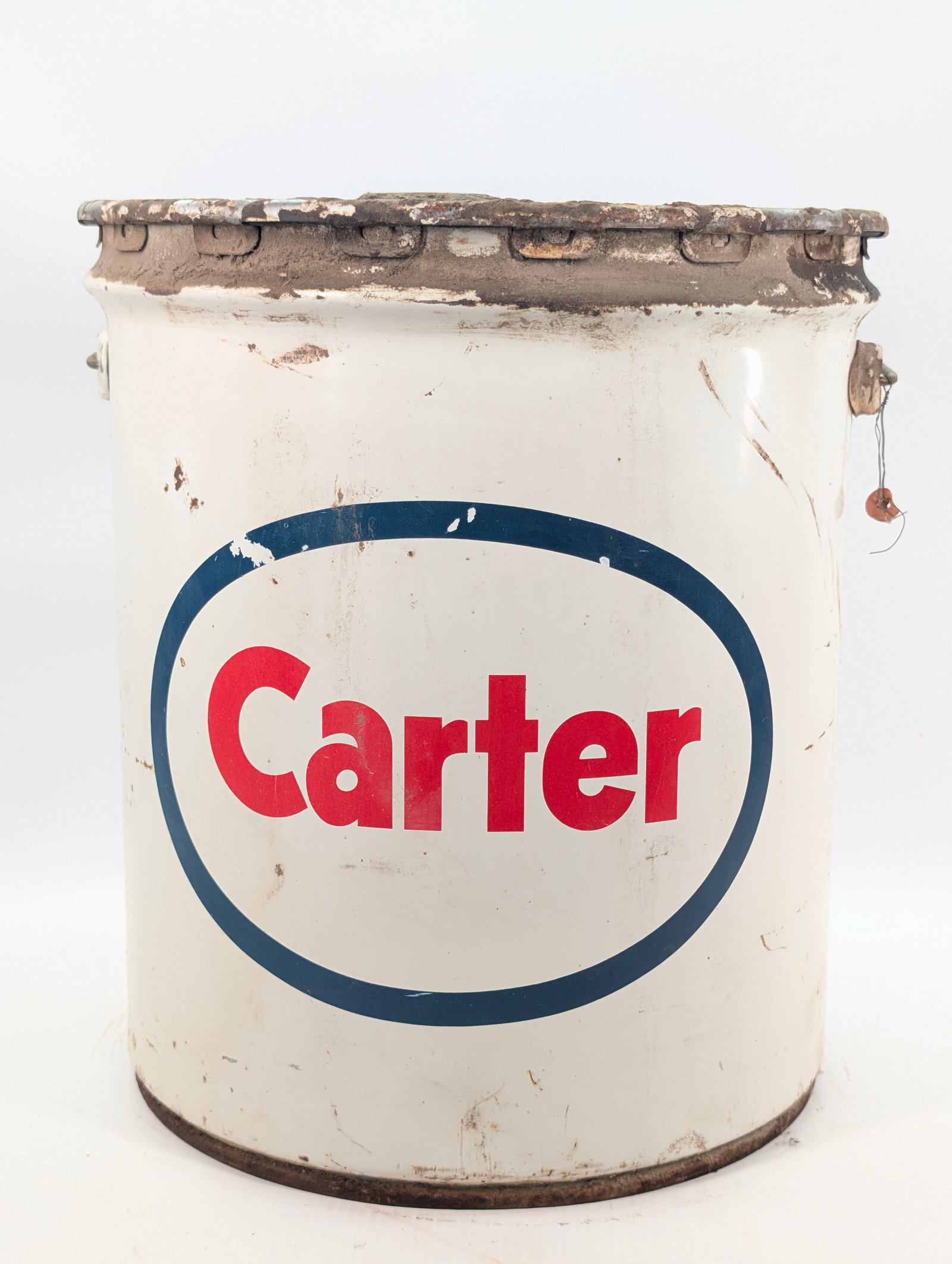 CARTER ESSO LUBRICANT 35 POUND BUCKET: REMAINS IN FAIR TO GOOD CONDITION, SHOWING SOME TYPICAL WEAR. CONTAINS SOME LUBRICANT
