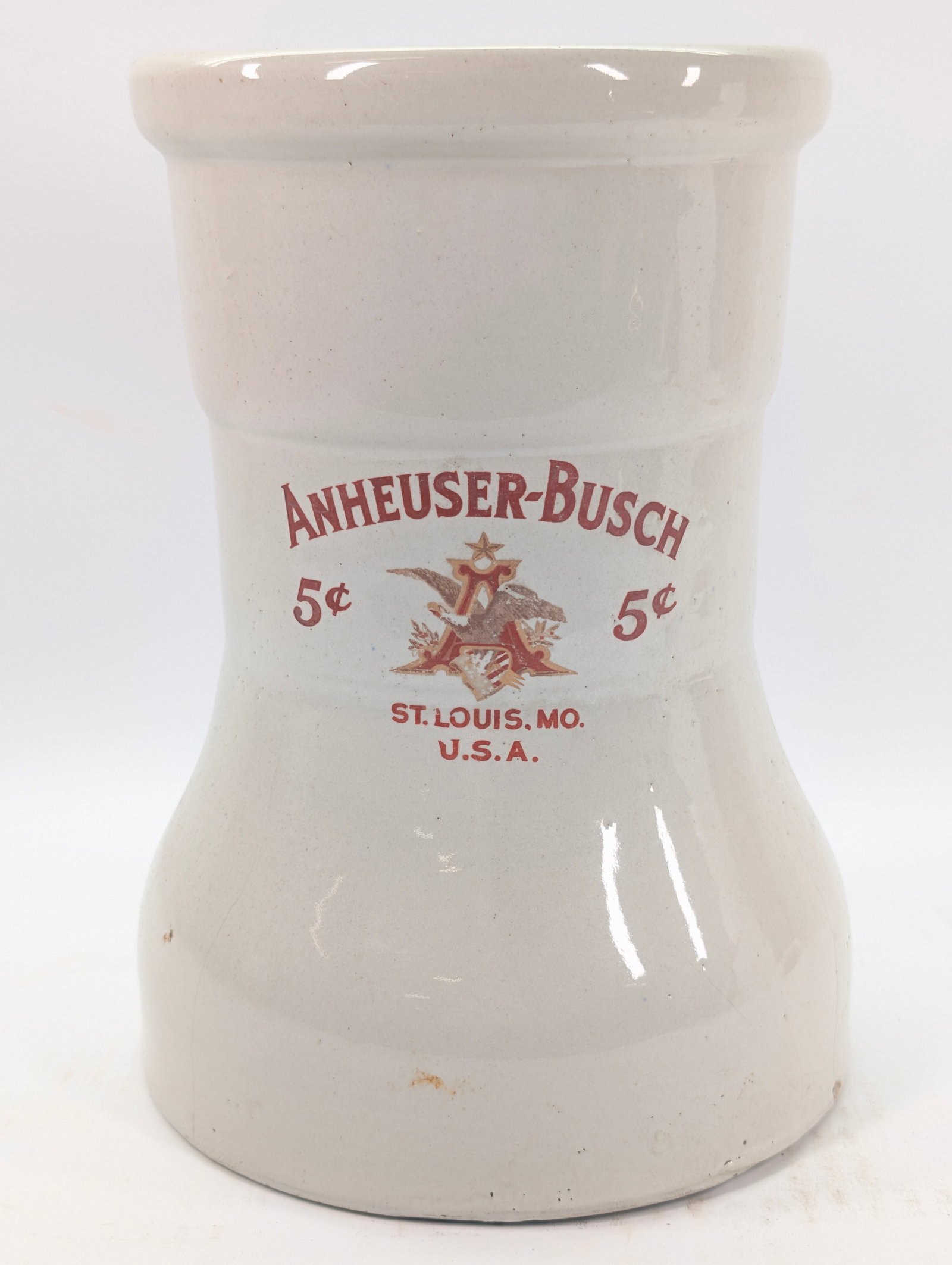 ANHEUSER BUSCH CERAMIC 5 CENT DISPENSER BASE: REMAINS IN GOOD CONDITION, SHOWING SOME TYPICAL WEAR. NO CHIPS, A FEW SMALL CRACKS.